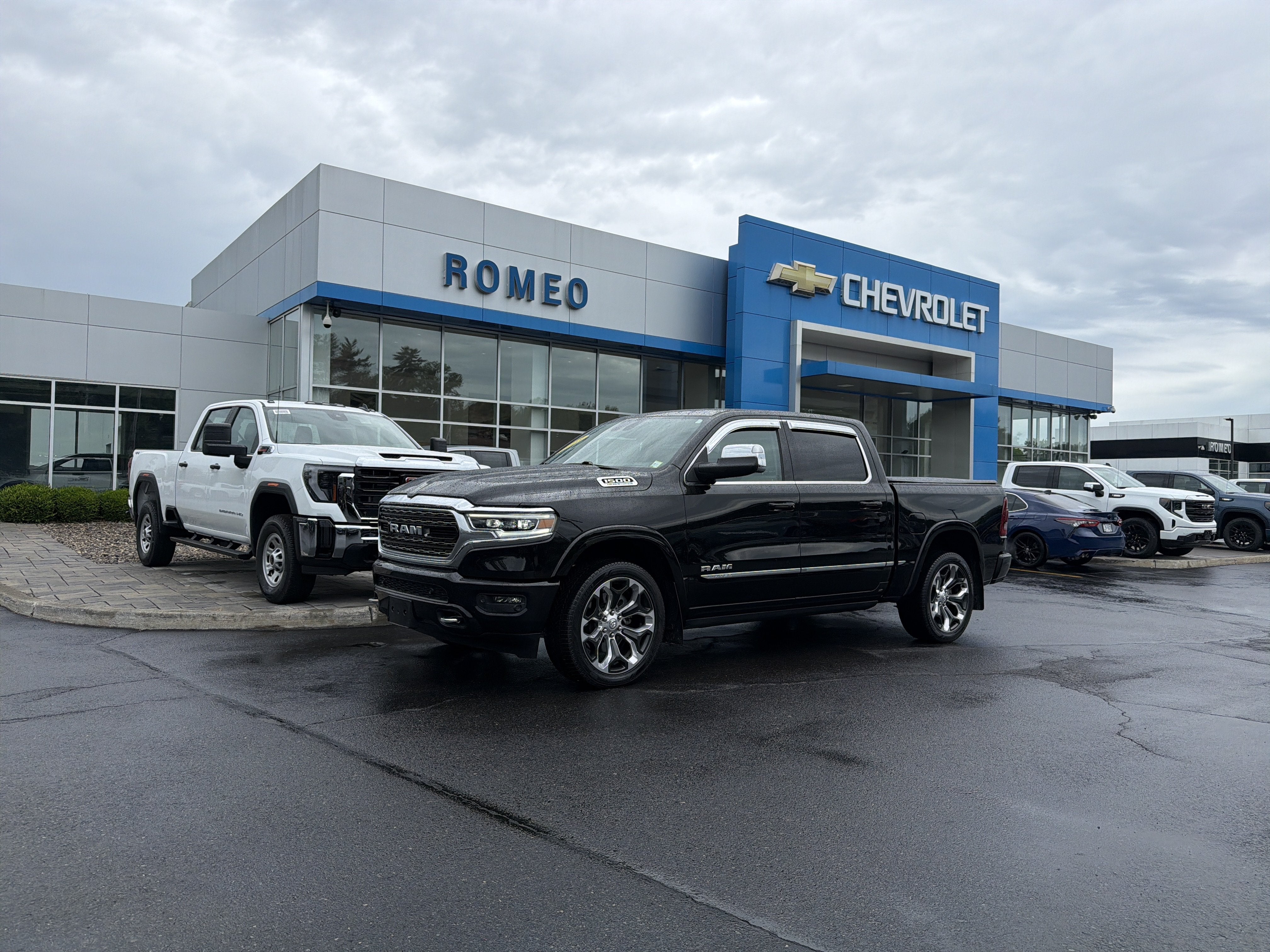 2023 RAM 1500 Limited Crew Cab 4x4 5'7" Box in Black — front three-quarter view