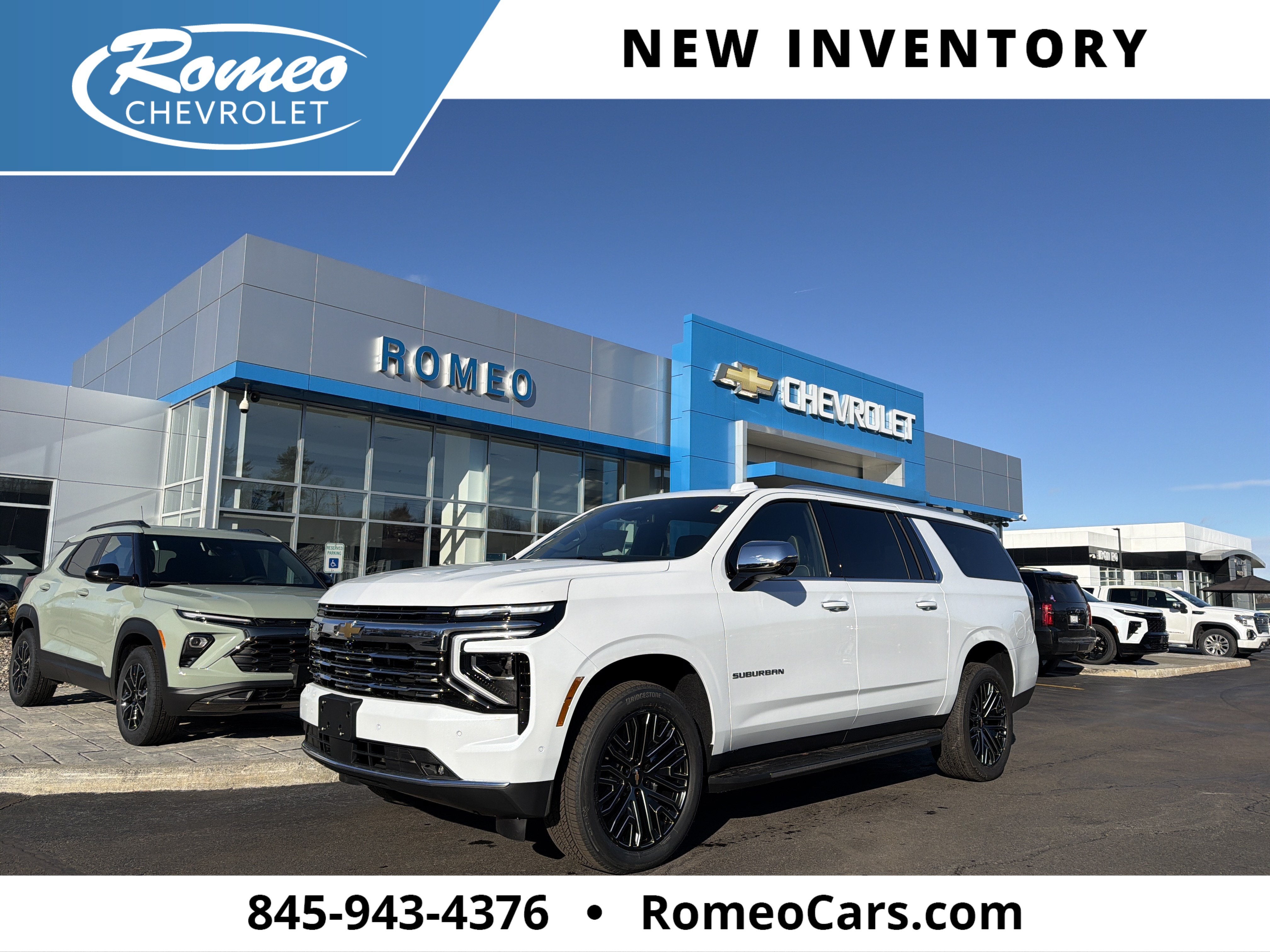 2026 Chevrolet Suburban Premier in Polar White Tricoat — front three-quarter view