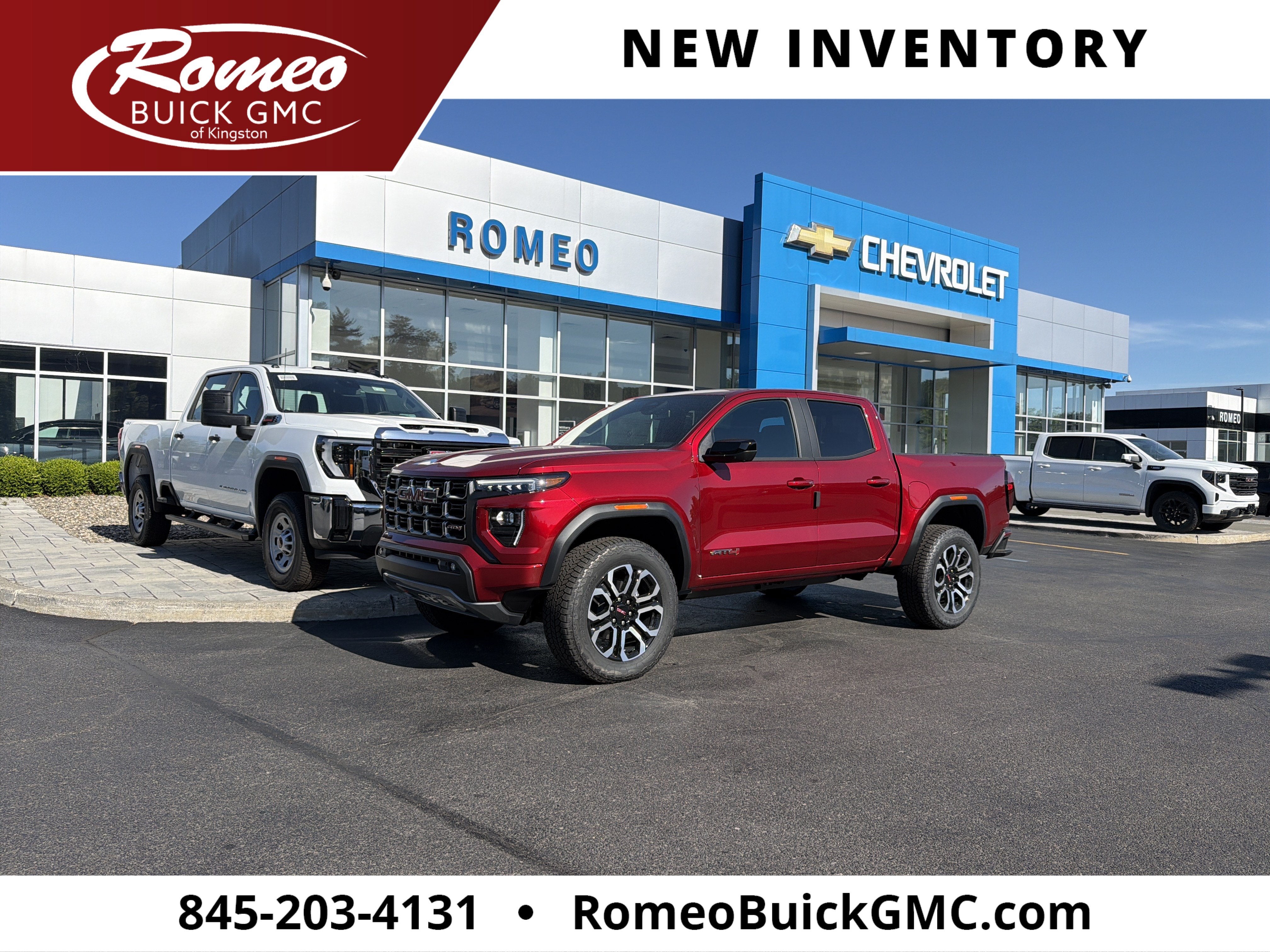 2026 GMC Canyon AT4 in Volcanic Red Tintcoat — front three-quarter view