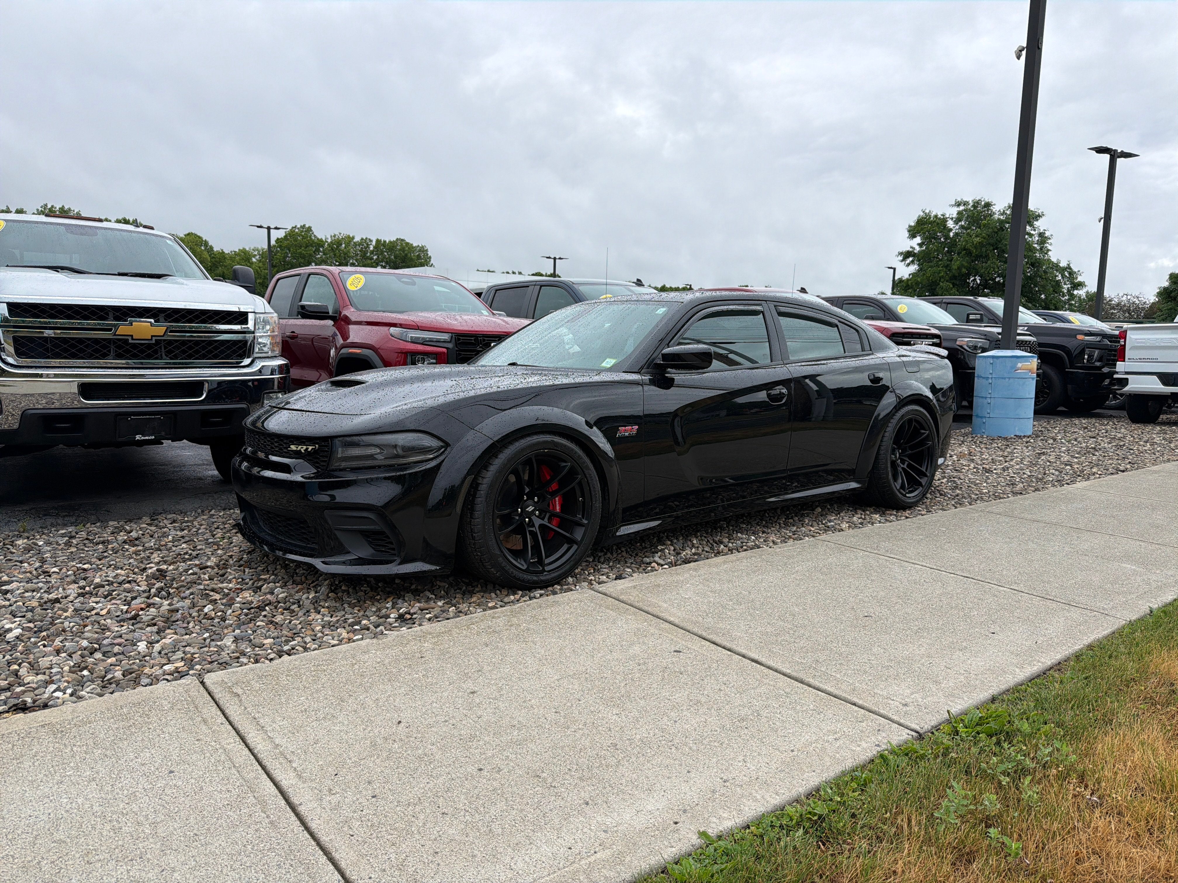 2020 Dodge Charger Scat Pack Widebody RWD in Black — front three-quarter view