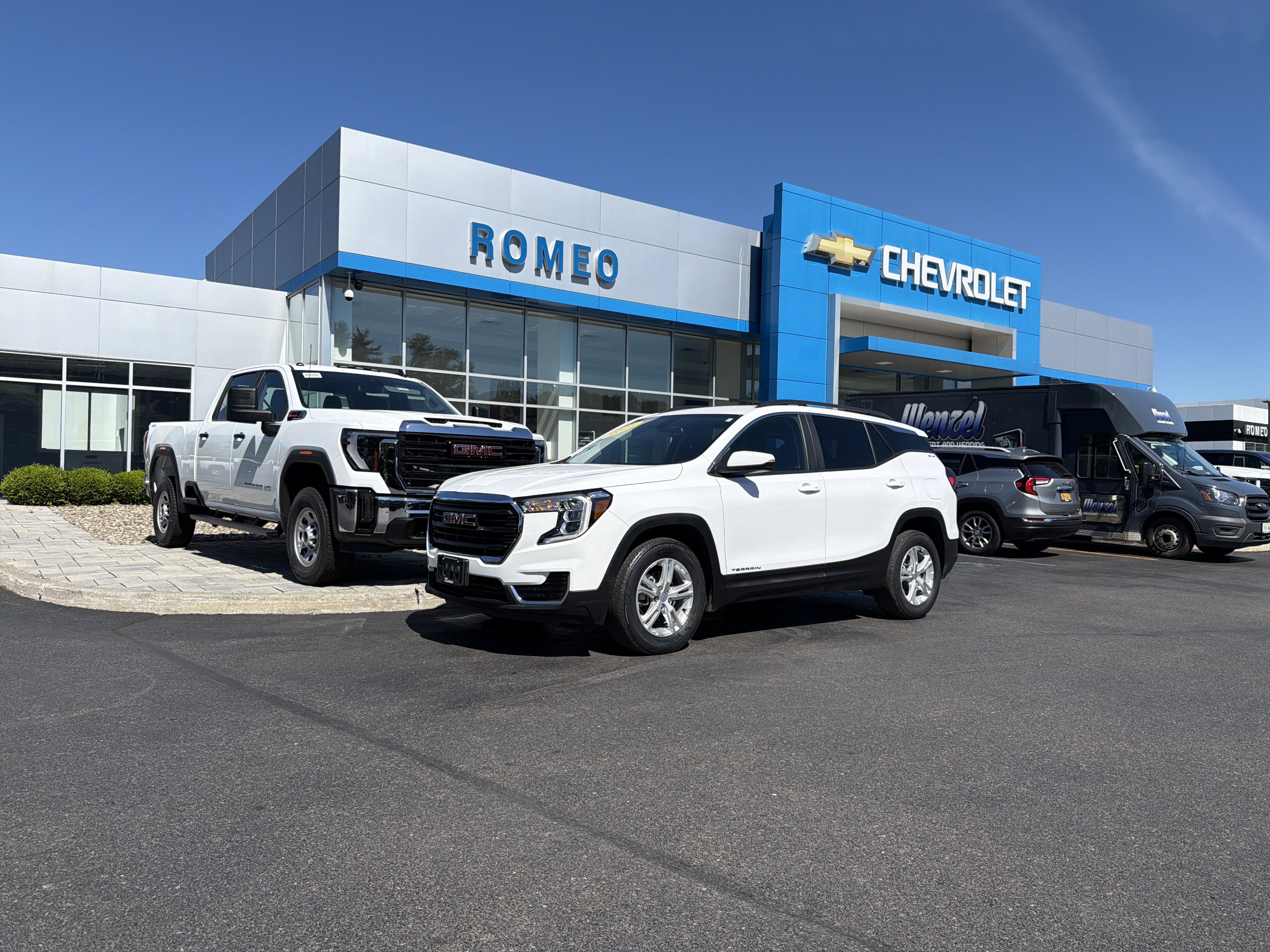 2023 GMC Terrain SLE in Summit White — front three-quarter view