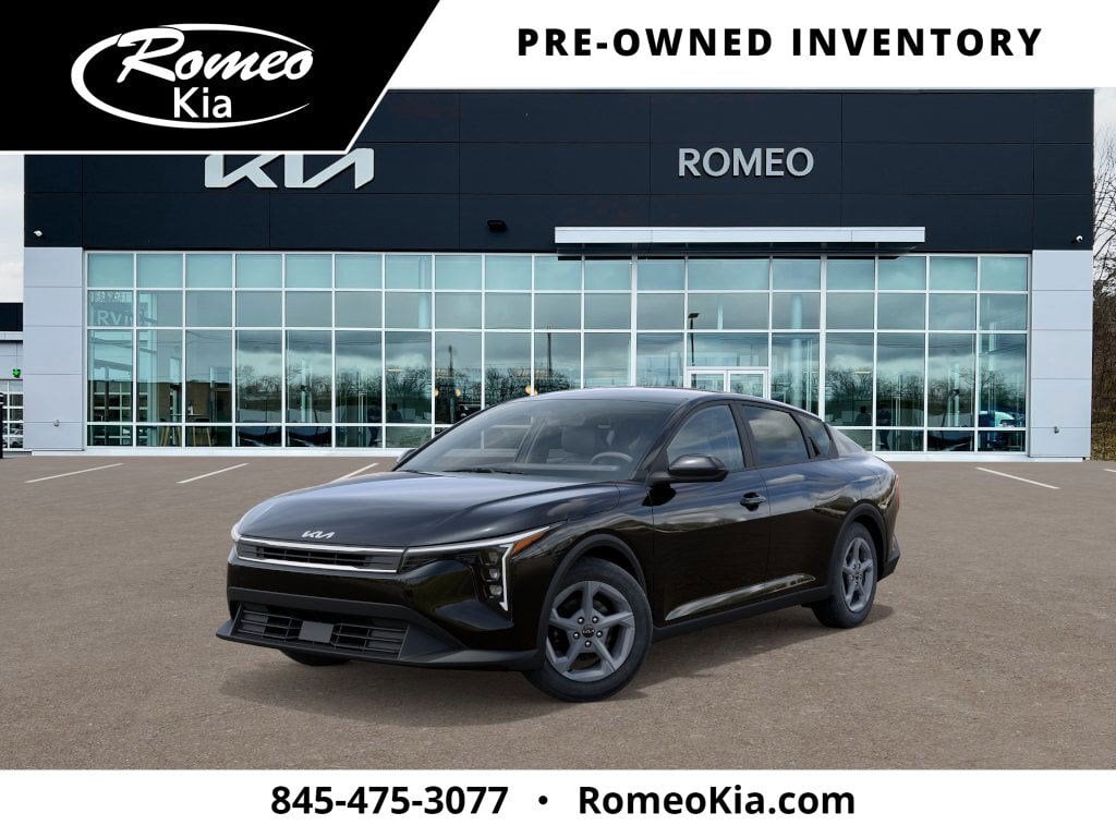 2025 Kia K4 LXS in Aurora Black Pearl — front three-quarter view