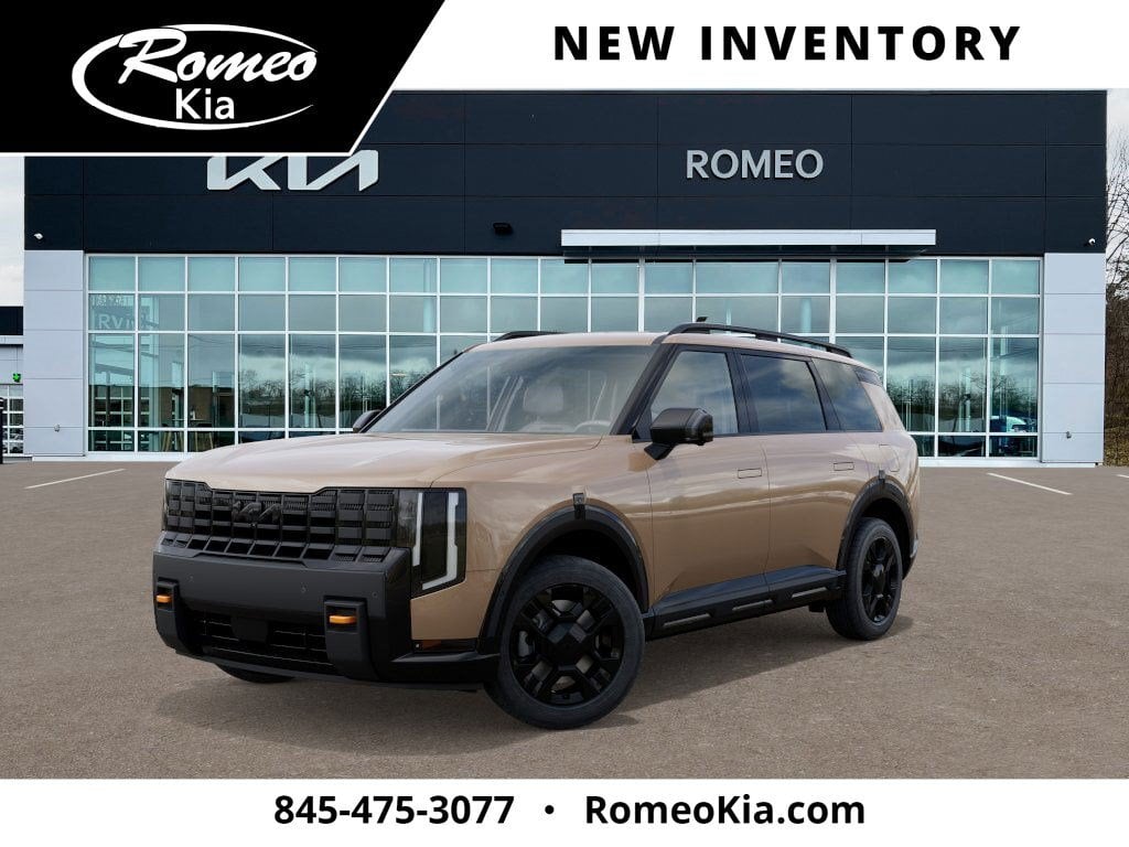 2027 Kia Telluride X-Pro SX-Prestige in Terrain Brown — front three-quarter view