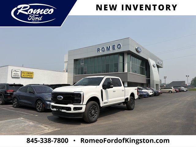 2026 Ford Super Duty F-350 Platinum in Star White Metallic Tri-Coat — front three-quarter view
