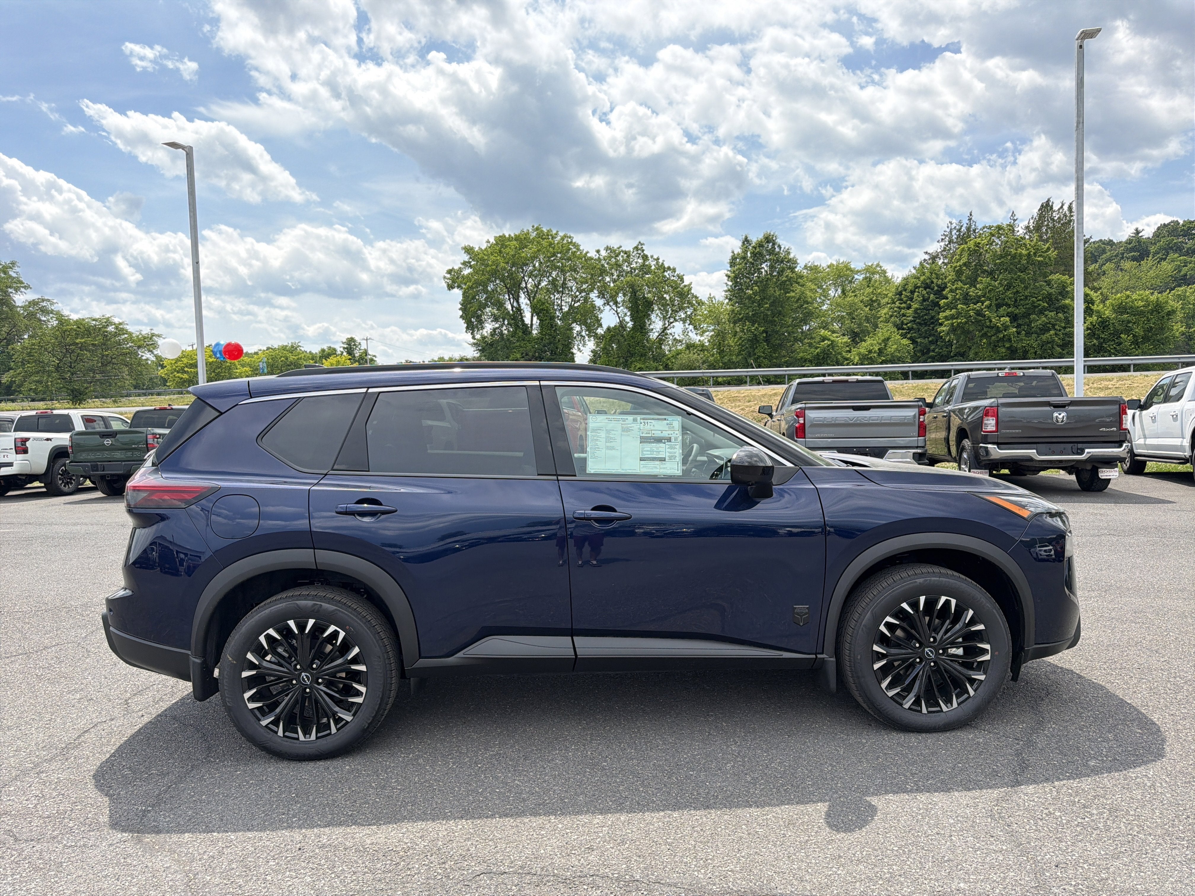 2026 Nissan Rogue — rear three-quarter view