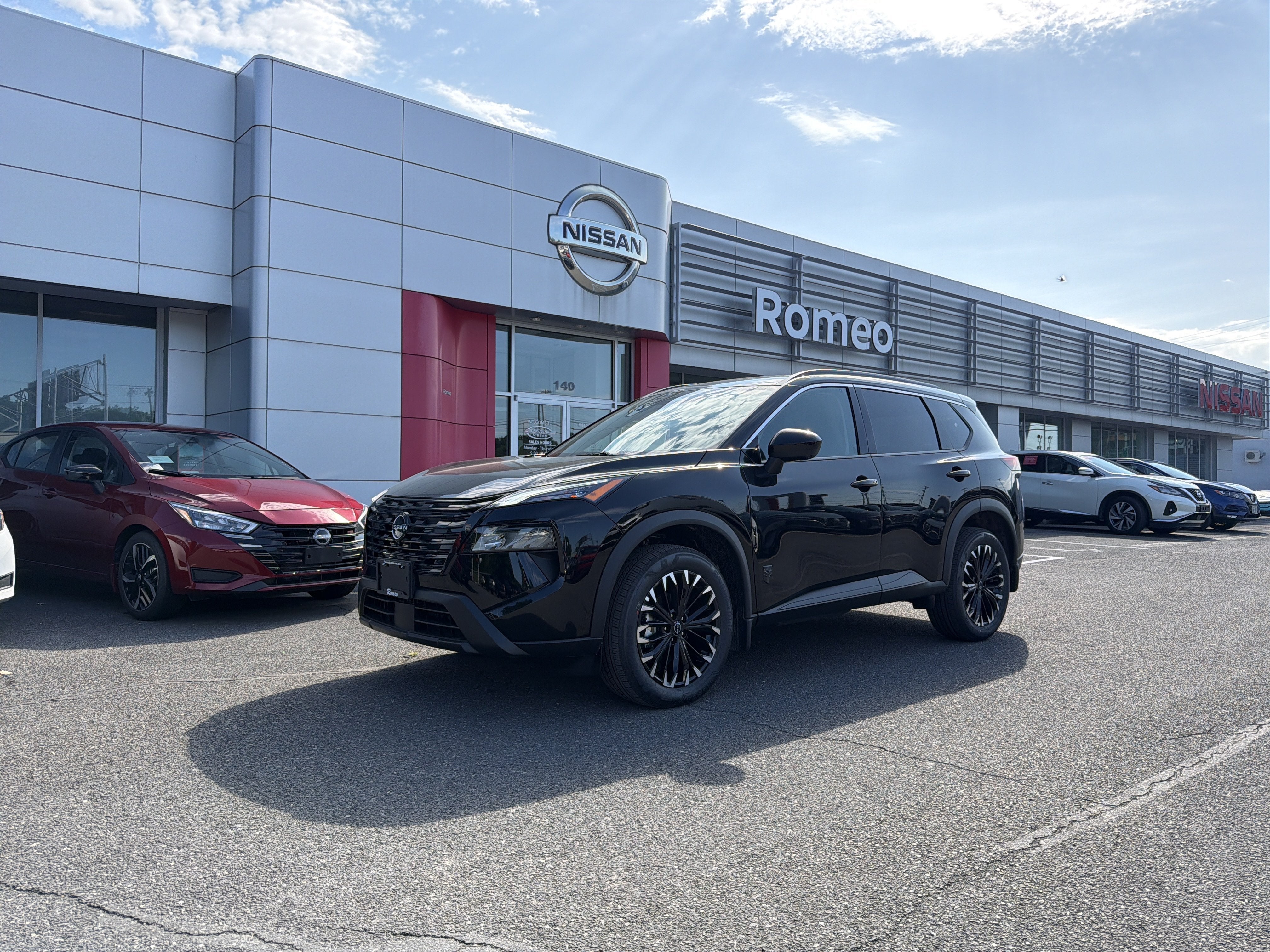 2026 Nissan Rogue Dark Armor in Super Black — front three-quarter view