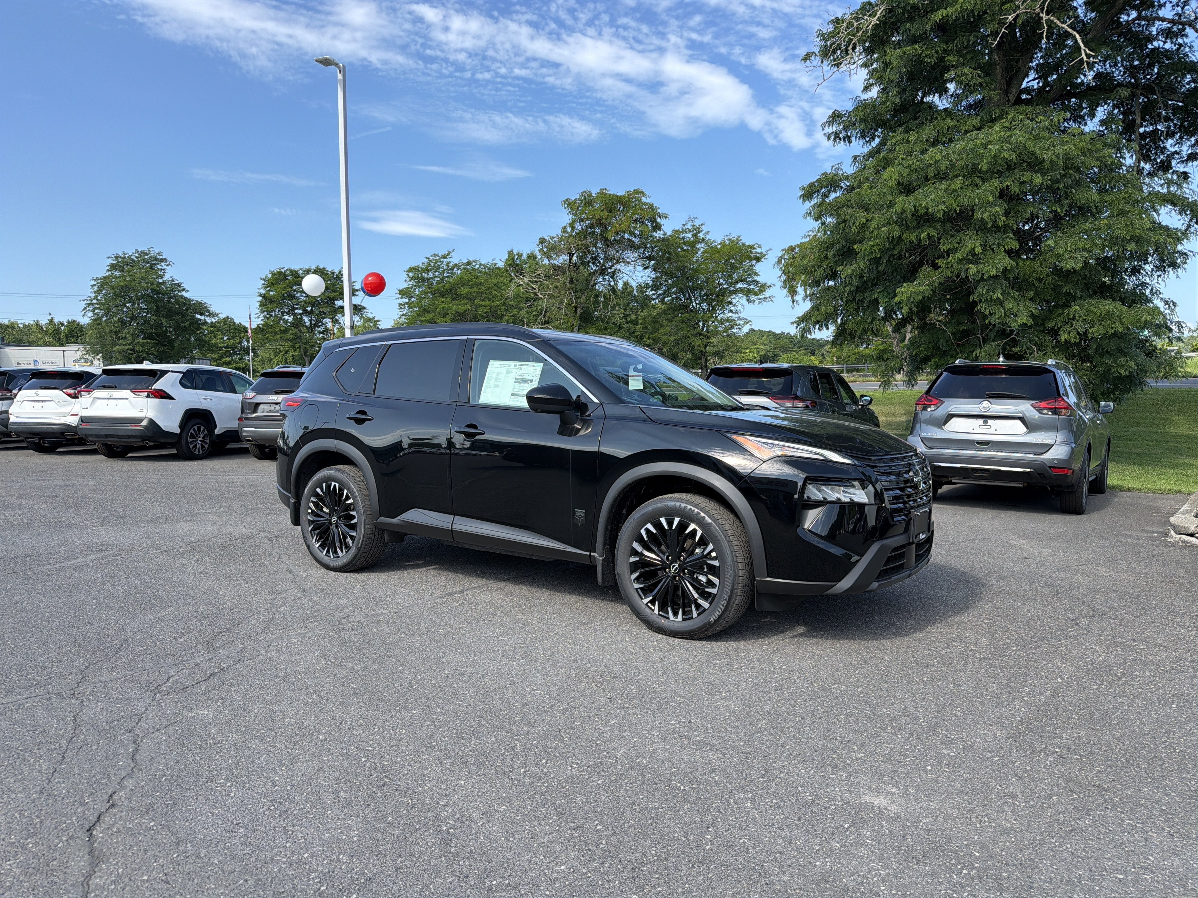 2026 Nissan Rogue — rear three-quarter view