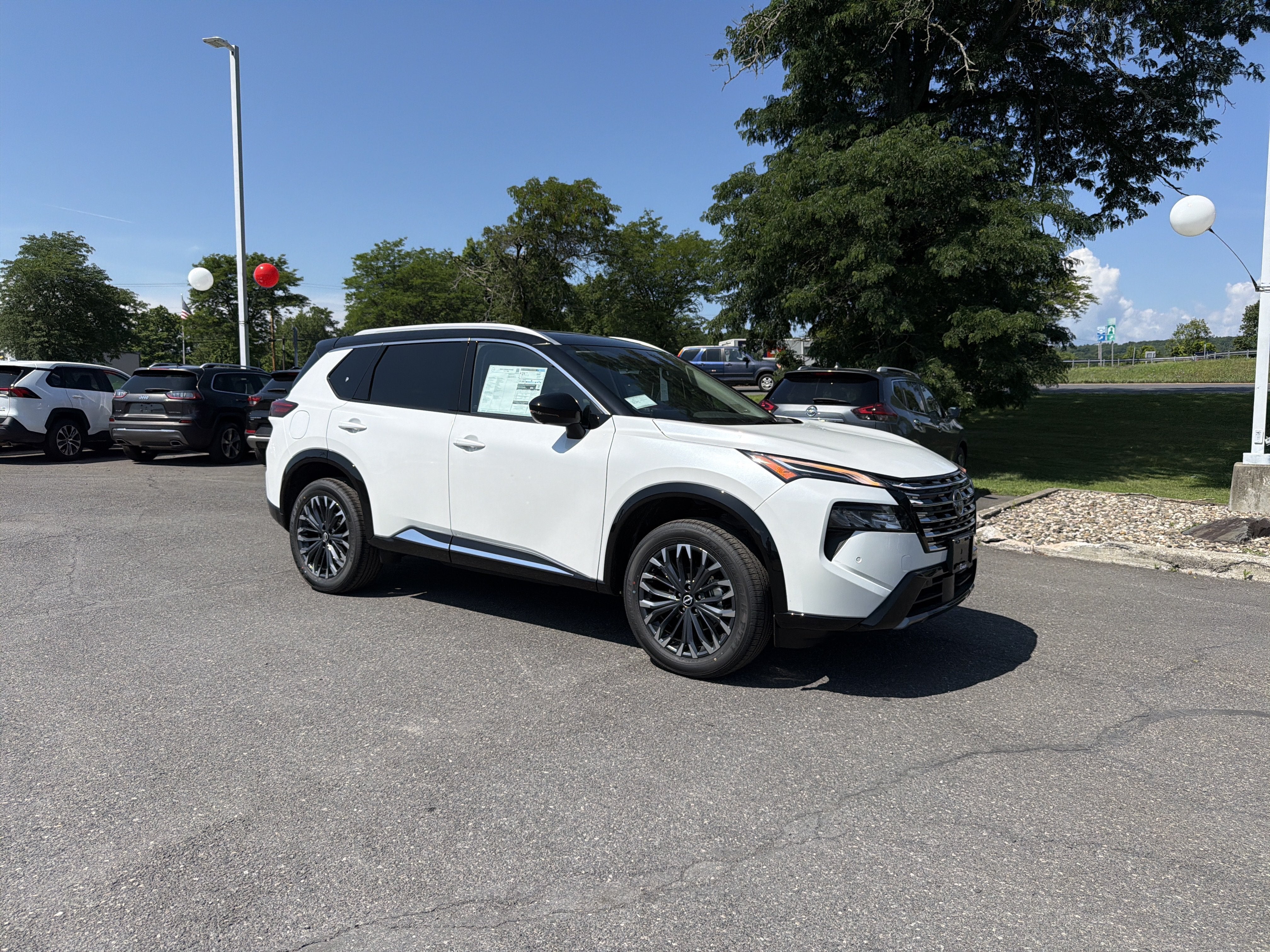 2026 Nissan Rogue — rear three-quarter view