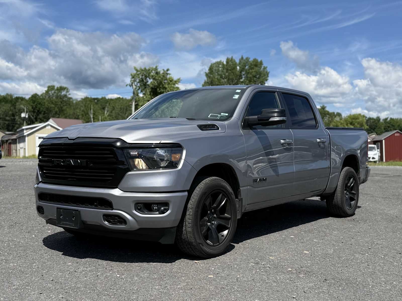 2021 RAM 1500 Big Horn/Lone Star in Billet Silver Metallic Clearcoat — front three-quarter view