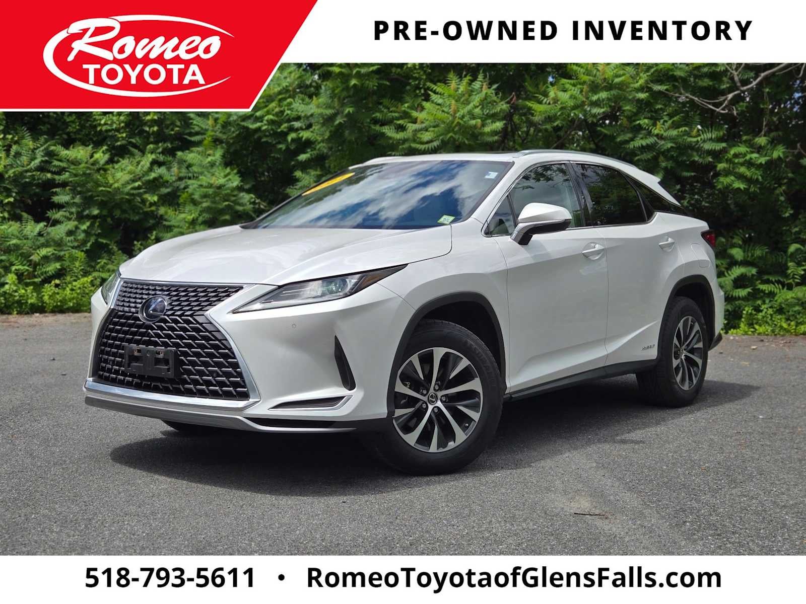 2021 Lexus RX 450h in White — front three-quarter view