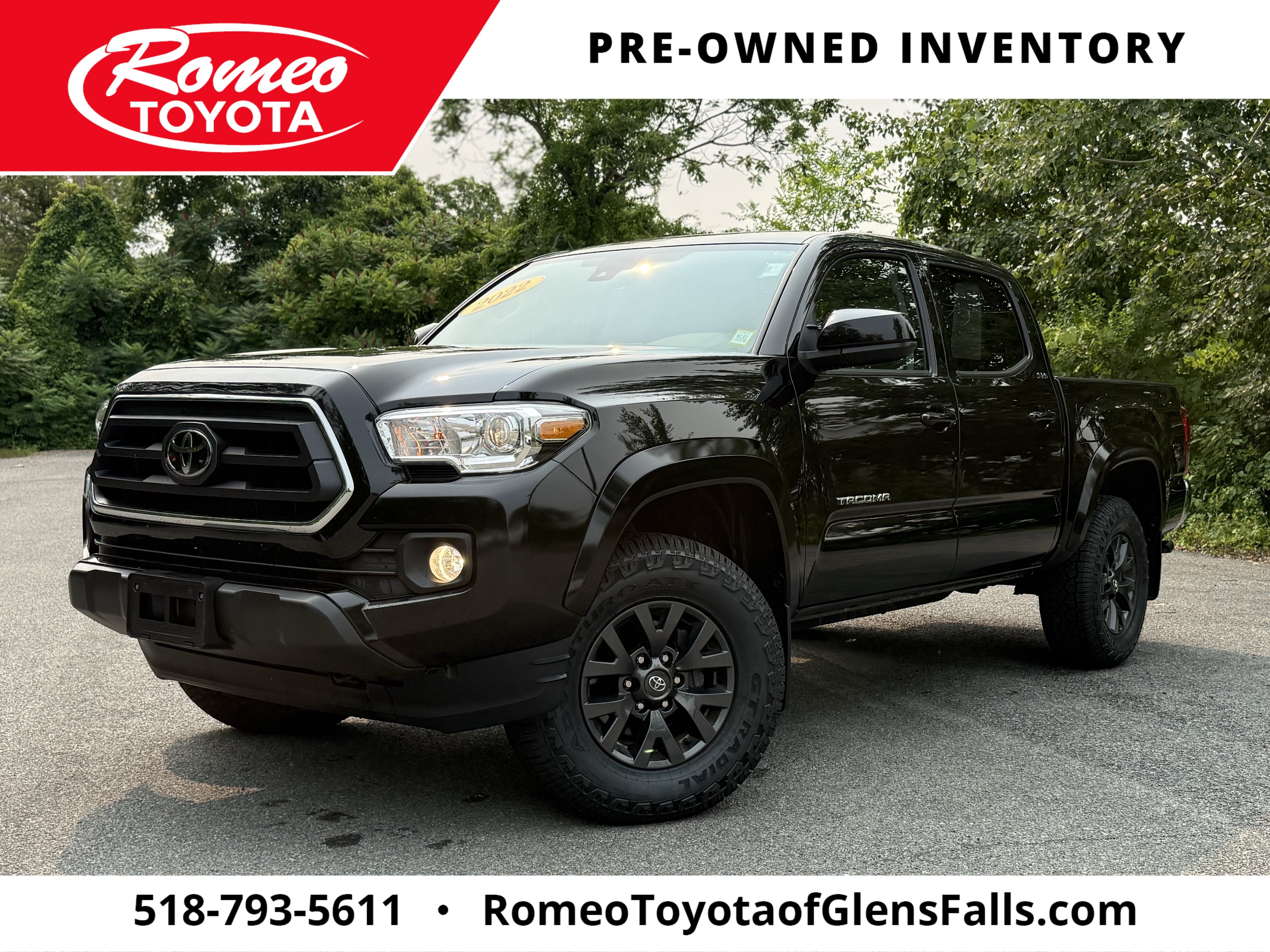 2022 Toyota Tacoma SR5 V6 in Midnight Black Metallic — front three-quarter view