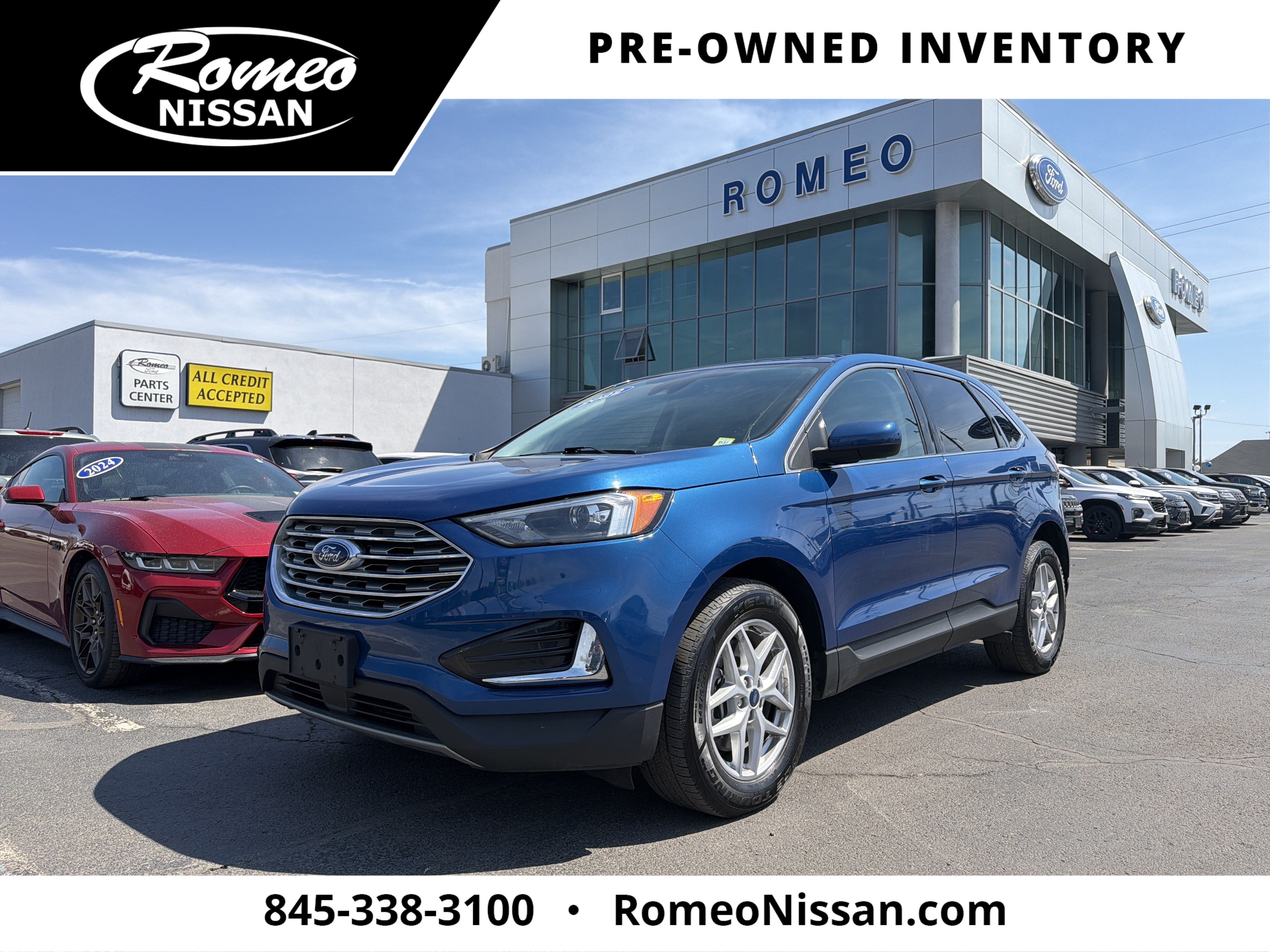 2022 Ford Edge SEL in Blue Metallic — front three-quarter view