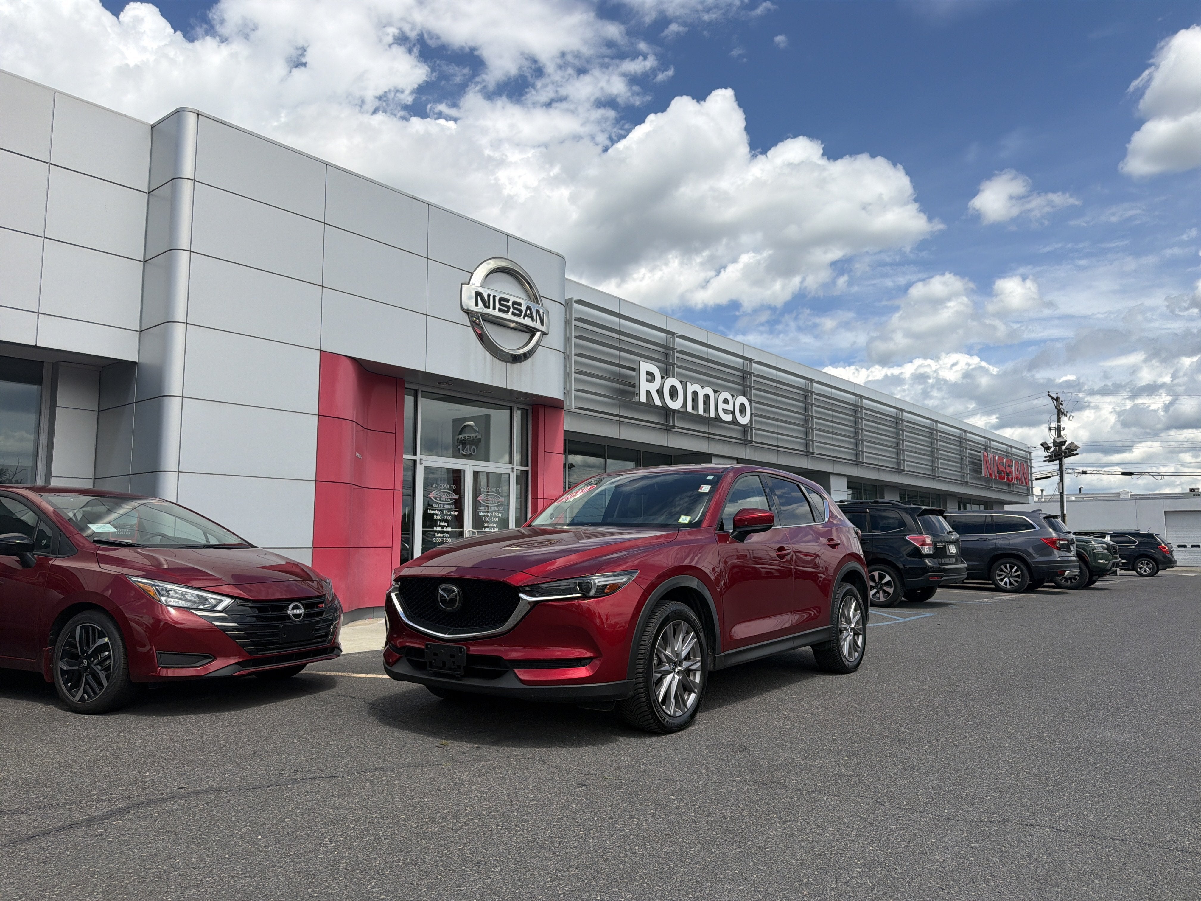2019 Mazda Mazda CX-5 Grand Touring in Soul Red Crystal Metallic — front three-quarter view