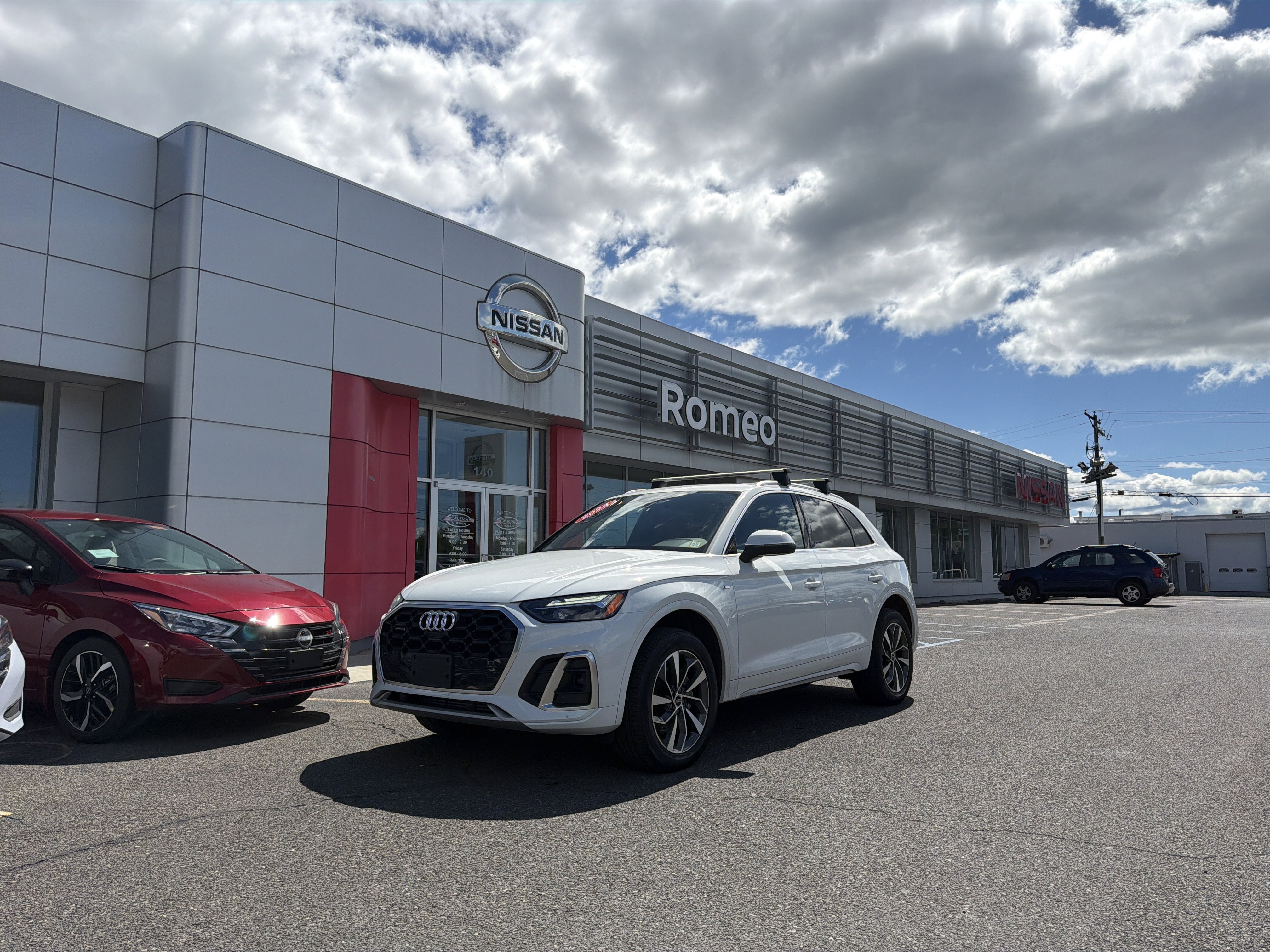 2024 Audi Q5 45 S line Premium quattro in Glacier White — front three-quarter view