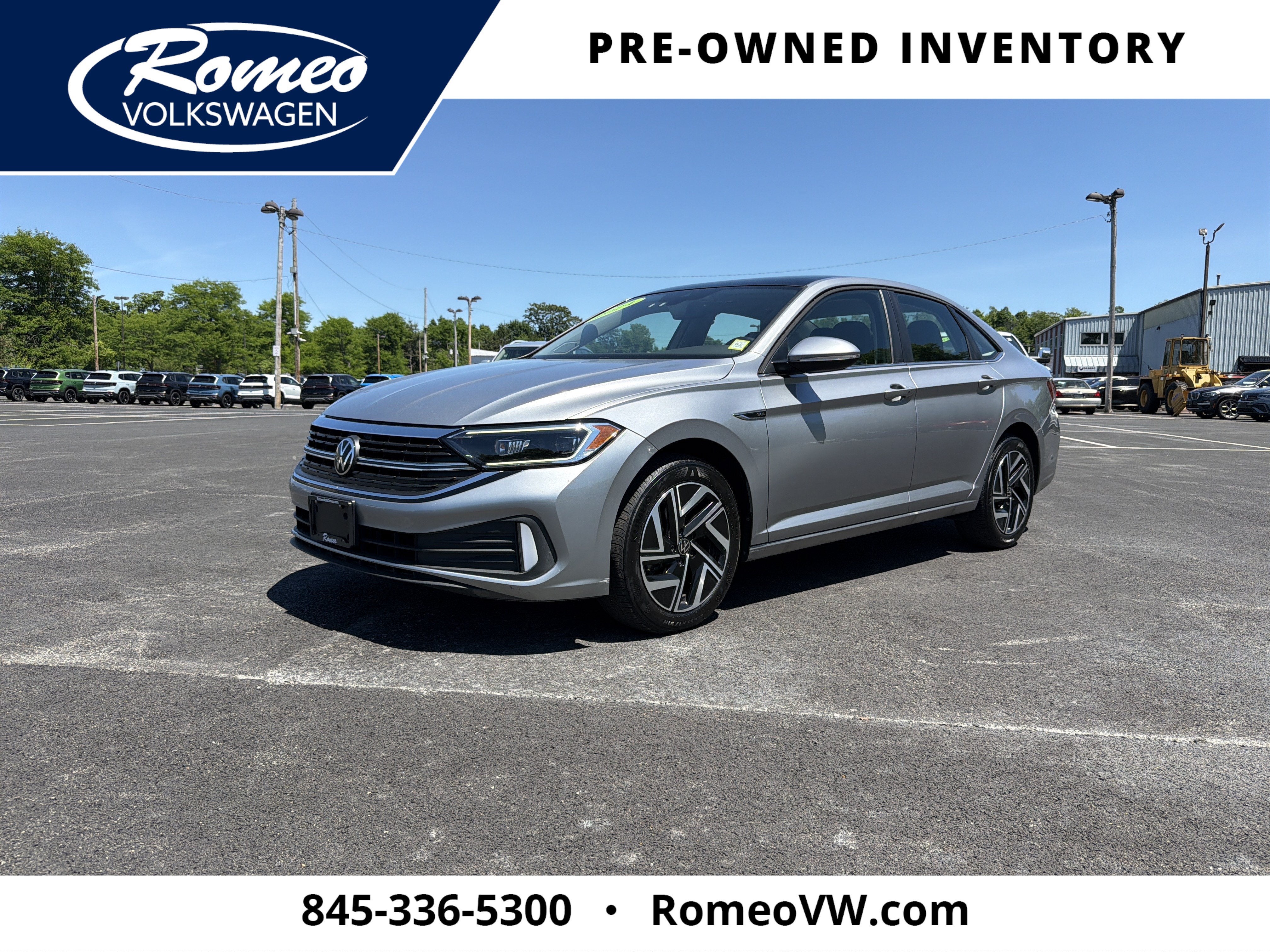 2024 Volkswagen Jetta 1.5T SEL in Pyrite Silver Metallic — front three-quarter view