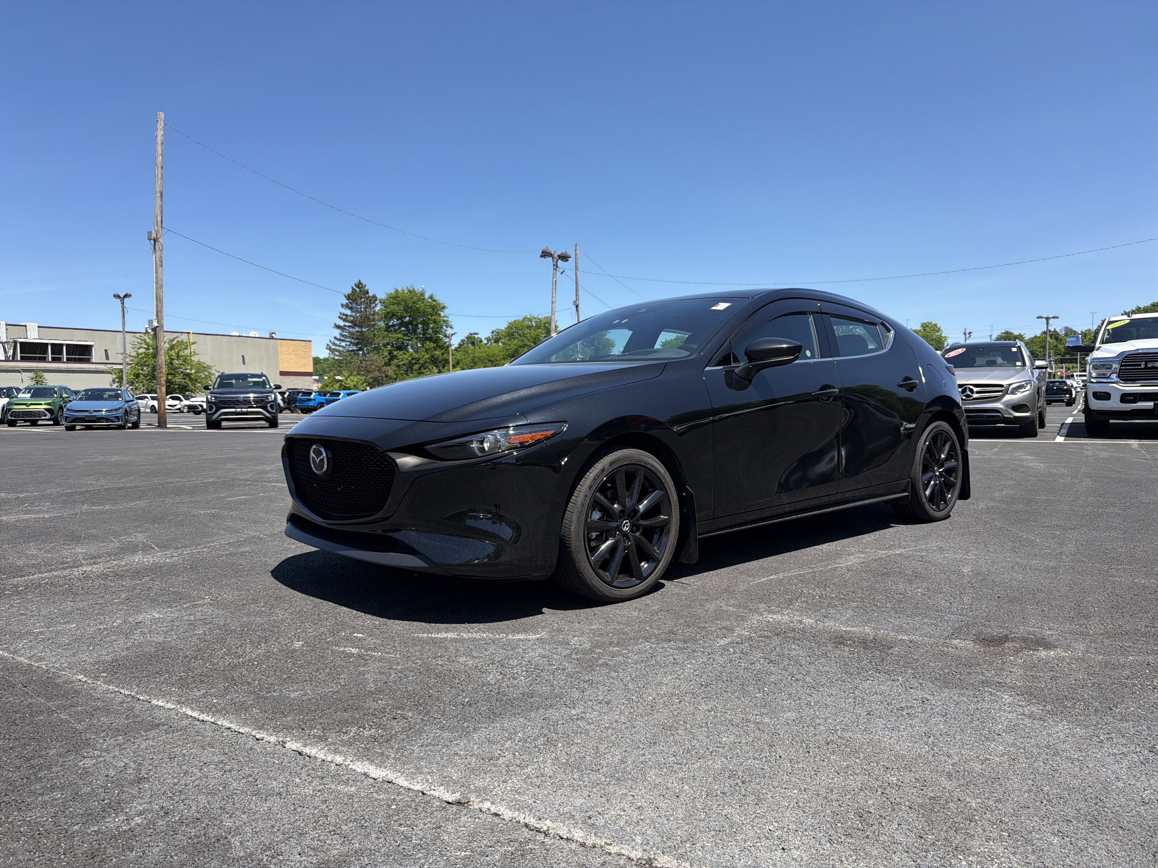 2023 Mazda Mazda3 2.5 S Premium Package in Jet Black Mica — front three-quarter view