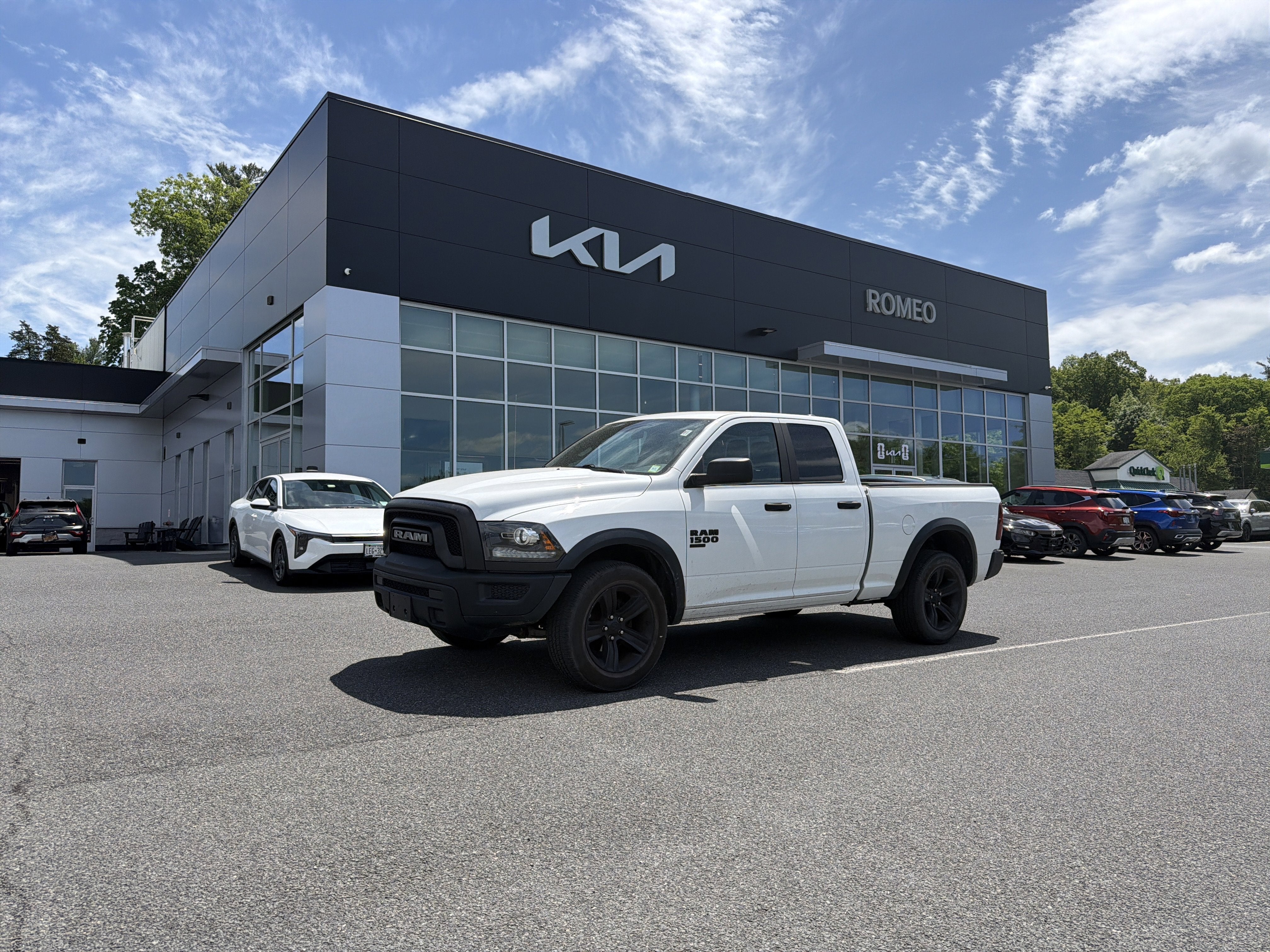 2021 RAM 1500 Classic Warlock in Bright White Clearcoat — front three-quarter view