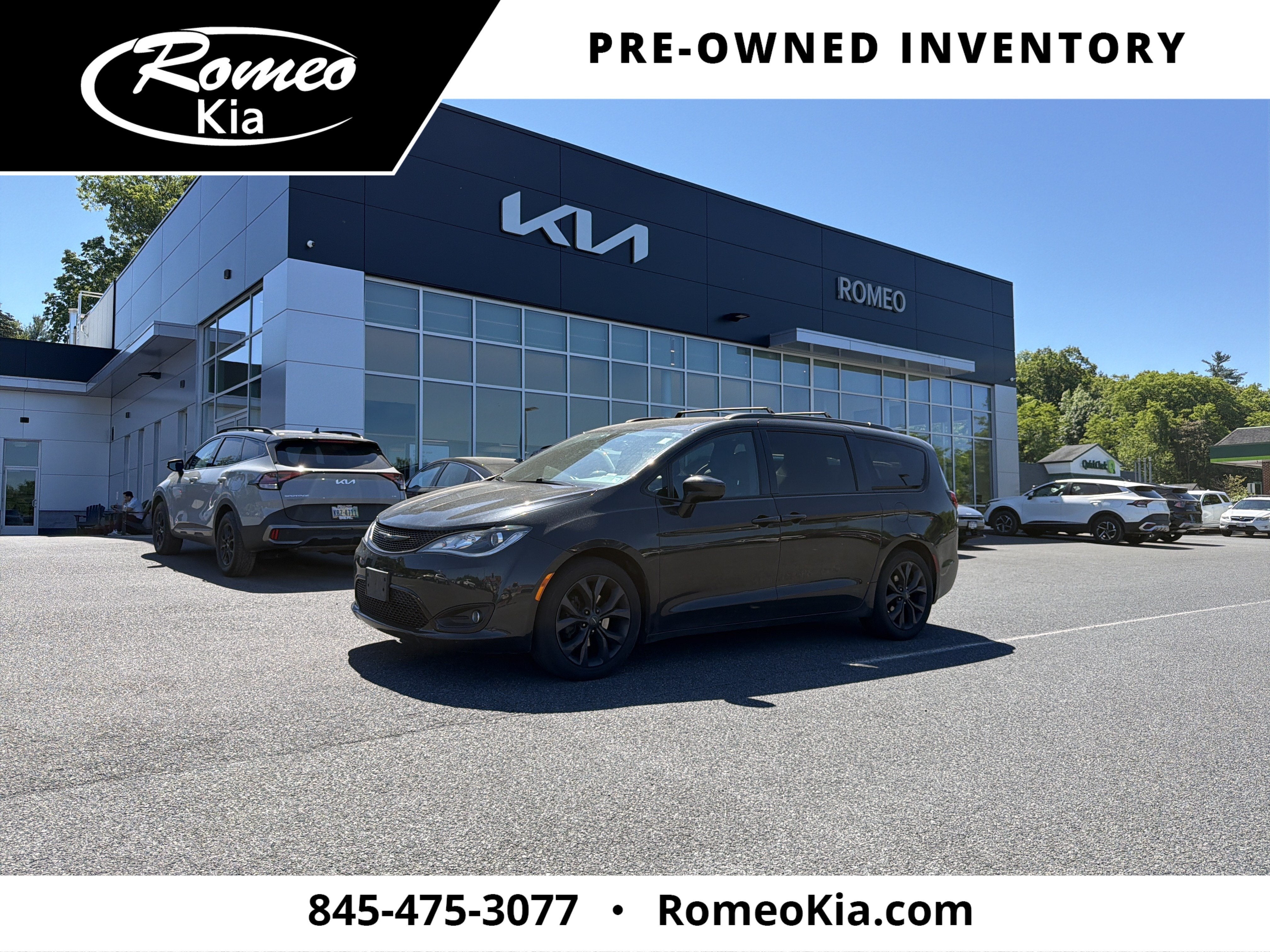 2020 Chrysler Pacifica Touring L in Brilliant Black Crystal Pearlcoat — front three-quarter view
