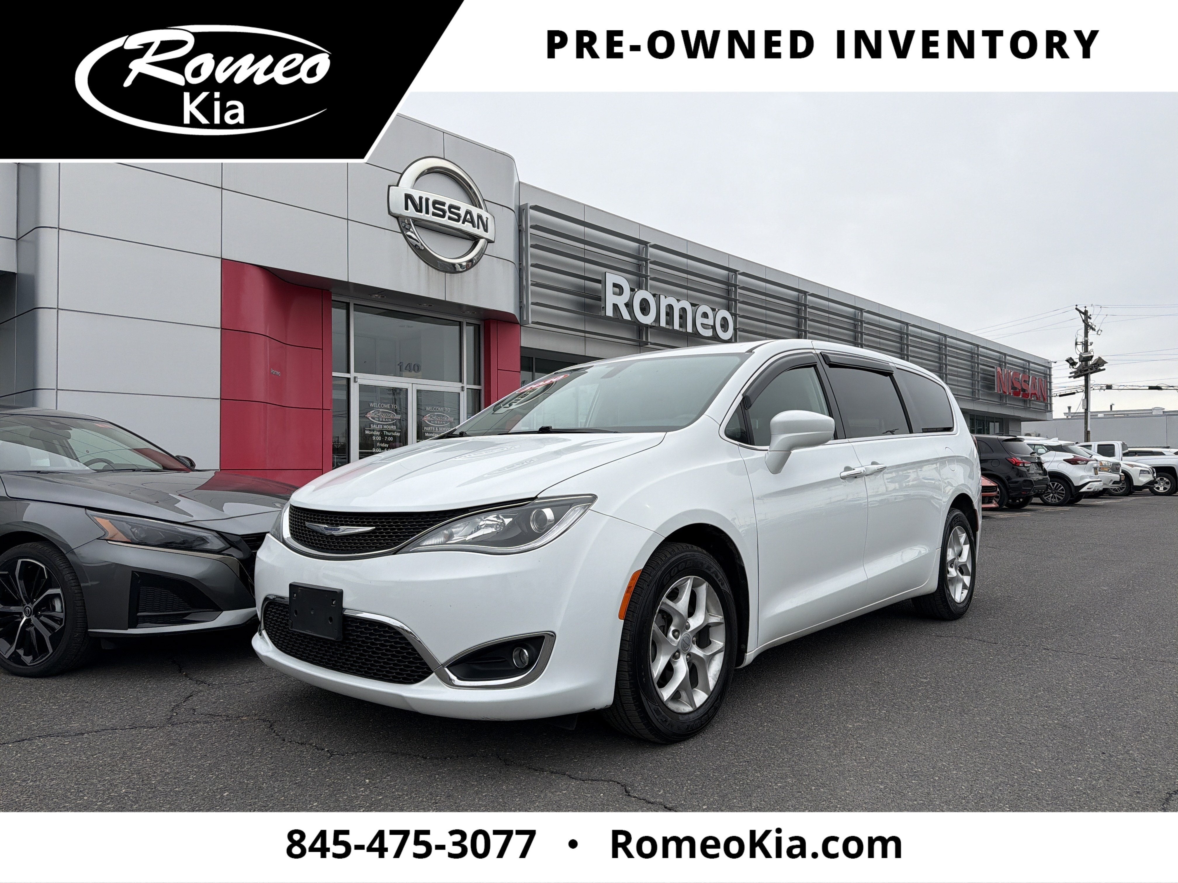 2020 Chrysler Pacifica Touring in Bright White Clearcoat — front three-quarter view