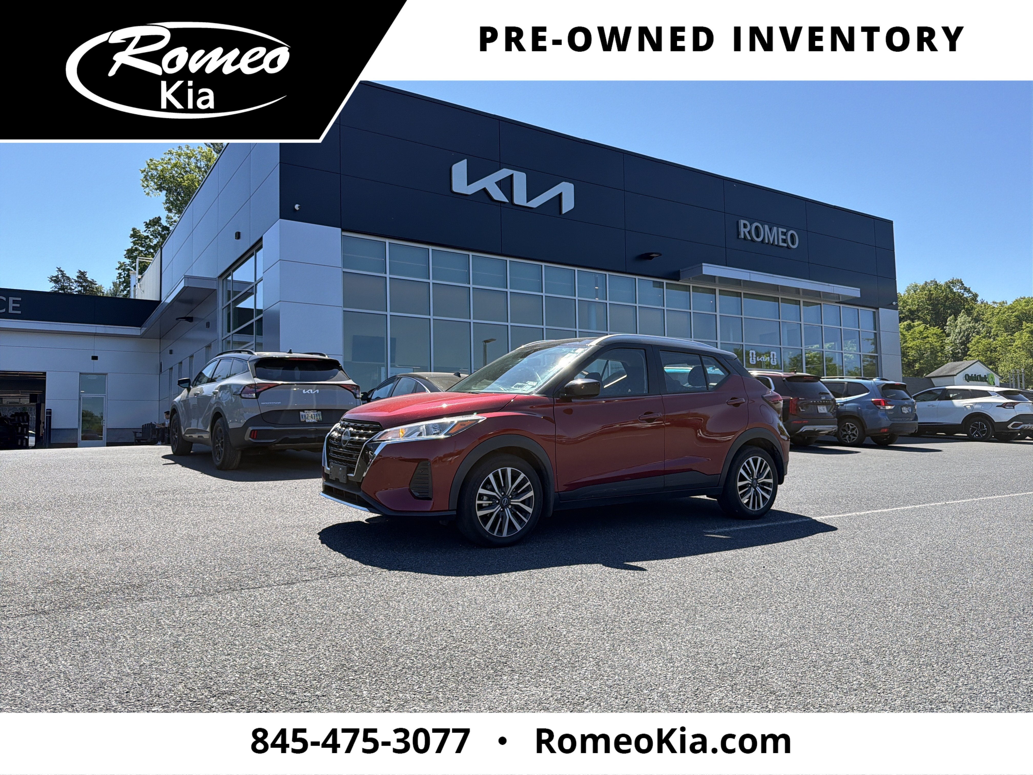 2023 Nissan Kicks SV in Scarlet Ember Tintcoat/Super Black — front three-quarter view