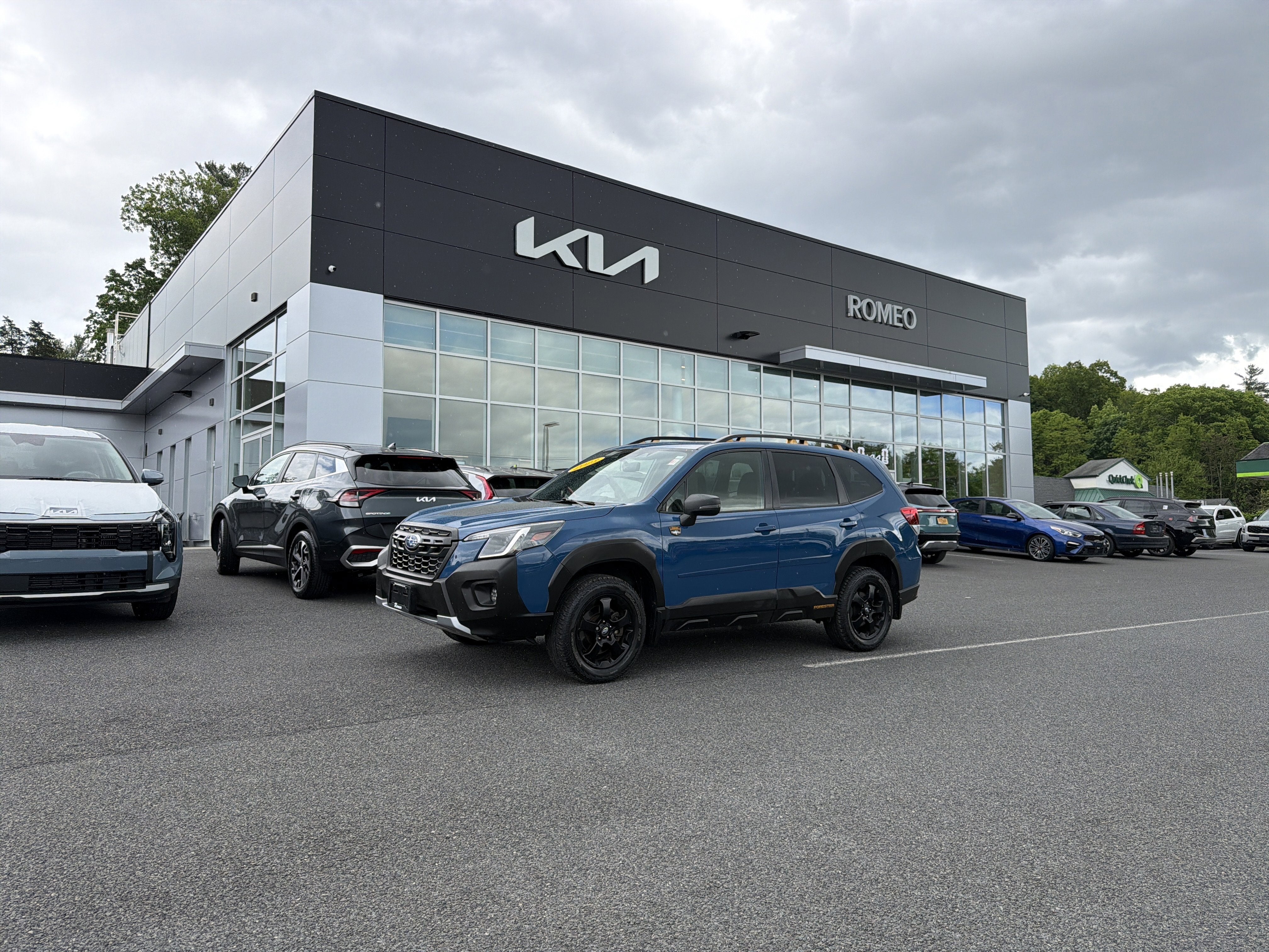 2023 Subaru Forester Wilderness in Geyser Blue — front three-quarter view