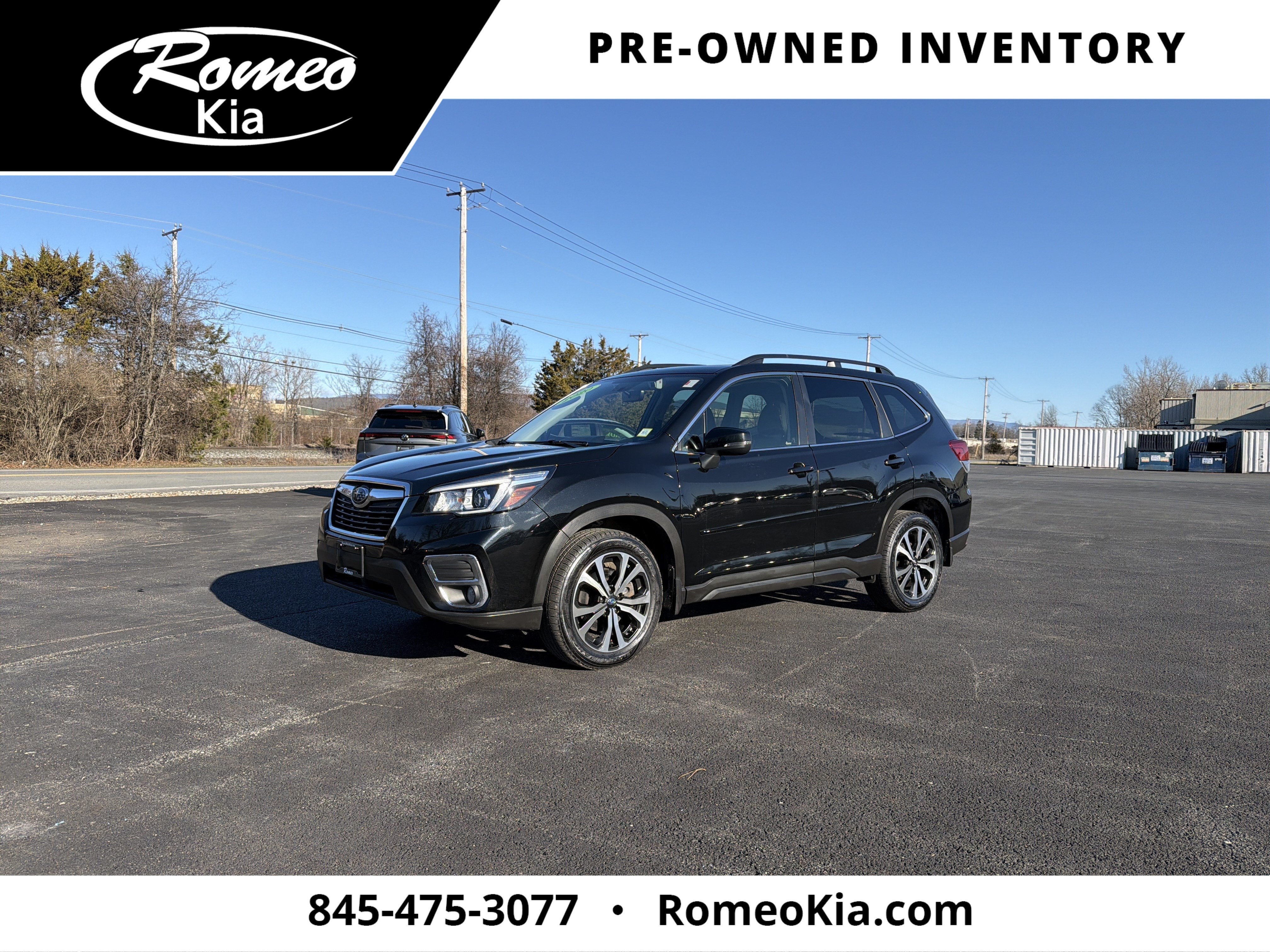 2020 Subaru Forester Limited in Crystal Black Silica — front three-quarter view