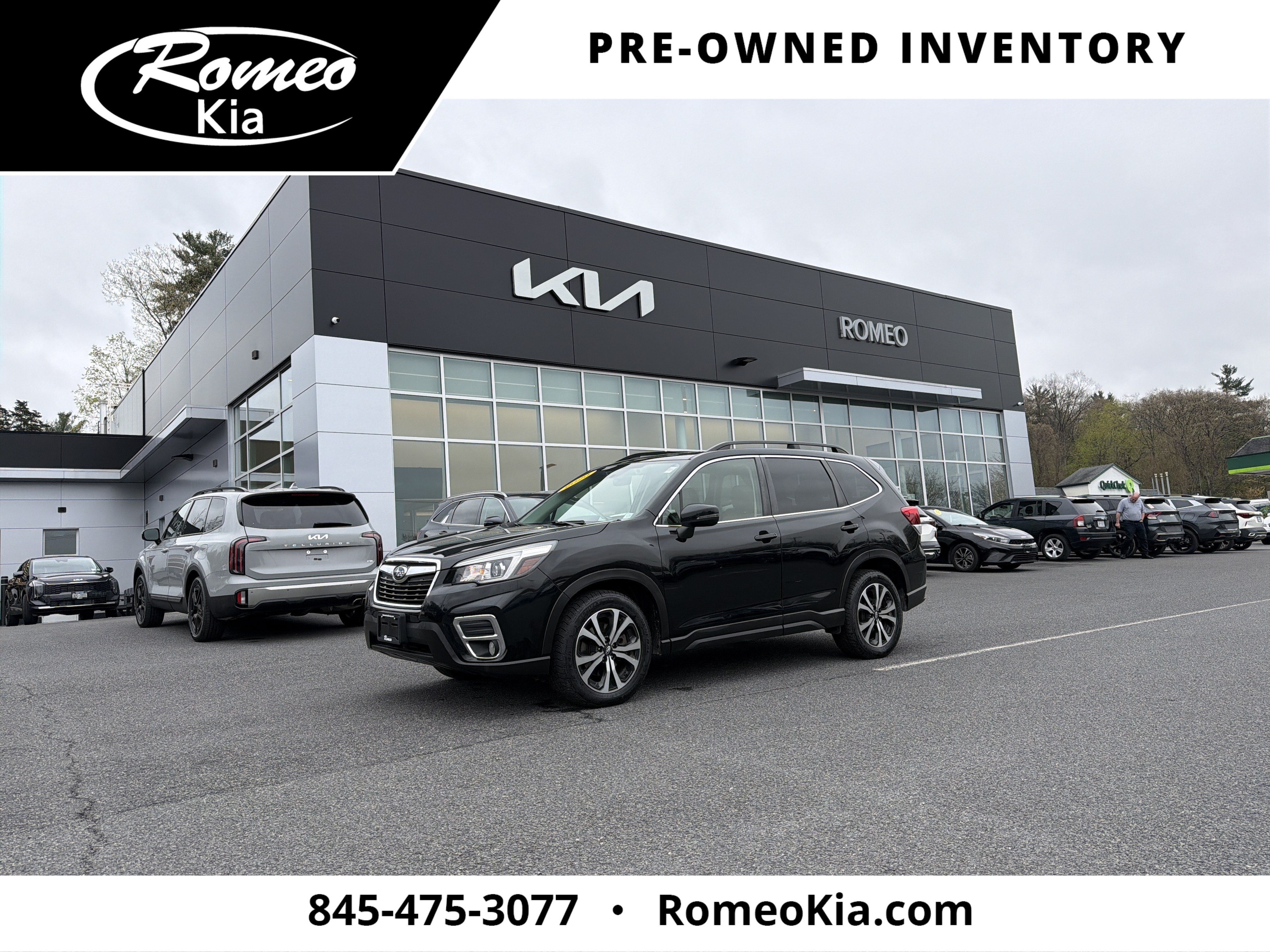 2020 Subaru Forester Limited in Crystal Black Silica — front three-quarter view