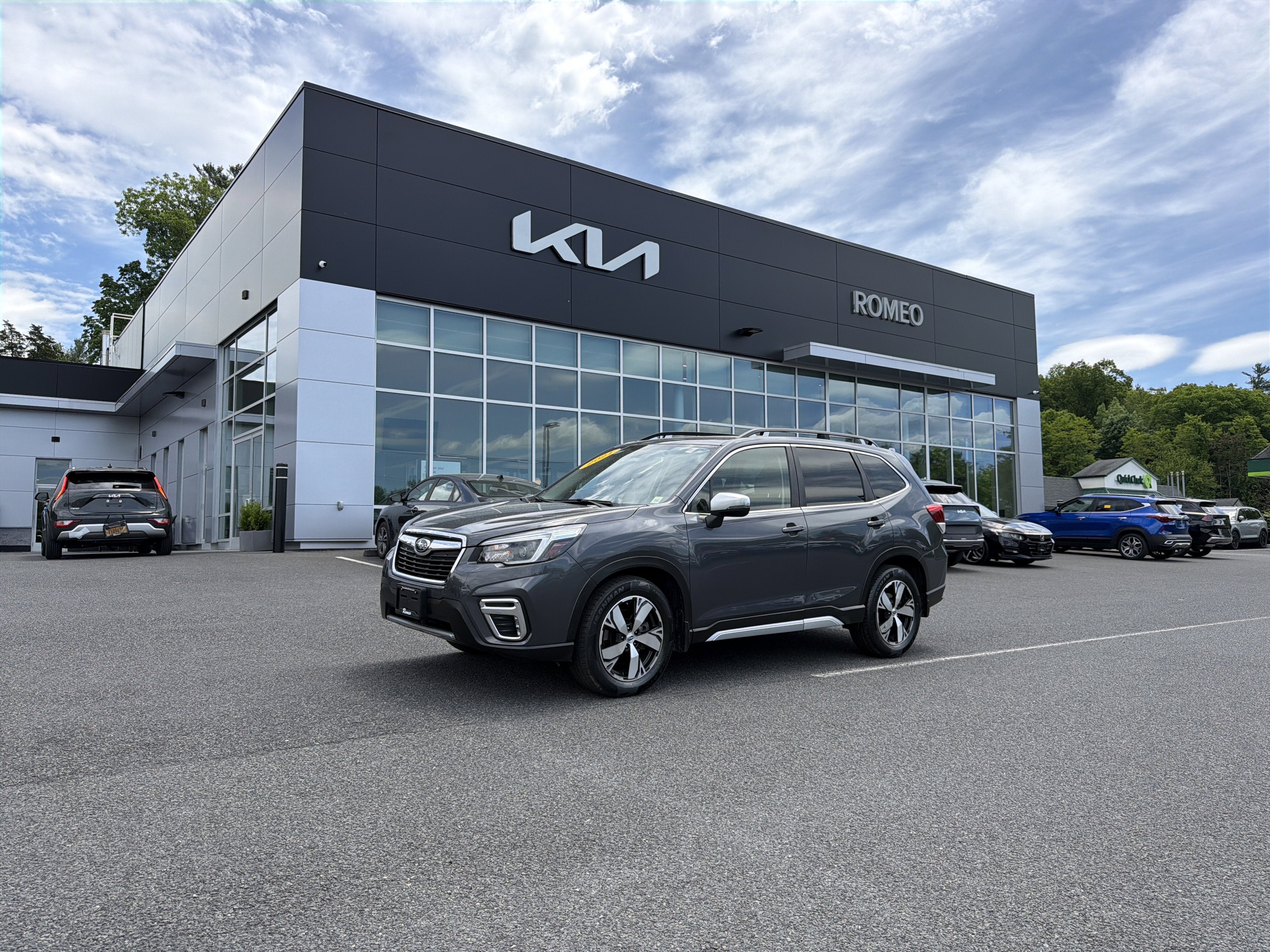 2021 Subaru Forester Touring in Magnetite Gray Metallic — front three-quarter view