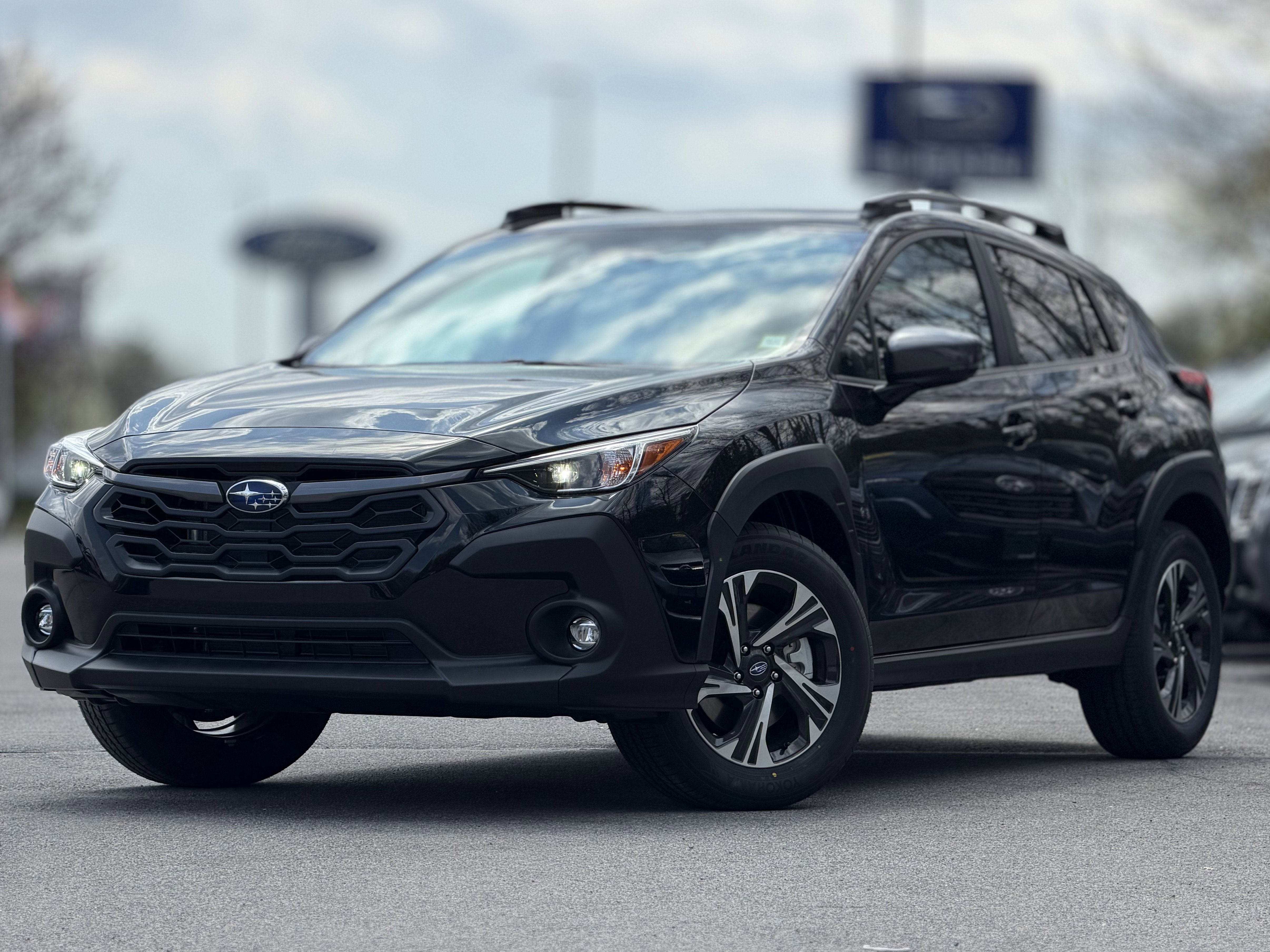 2026 Subaru CROSSTREK Premium in Crystal Black Silica — front three-quarter view