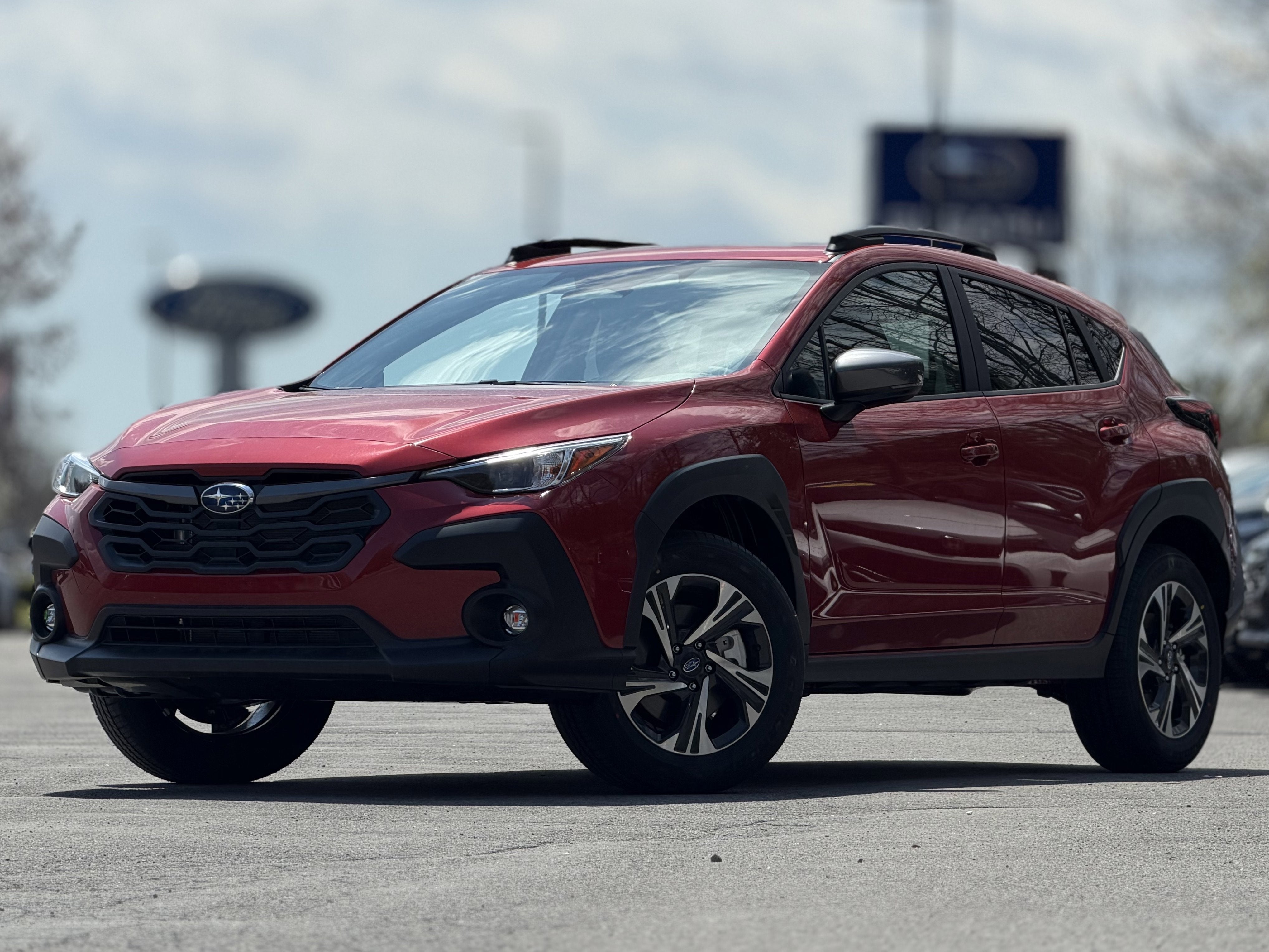 2026 Subaru CROSSTREK Premium in Lithium Red Pearl — front three-quarter view