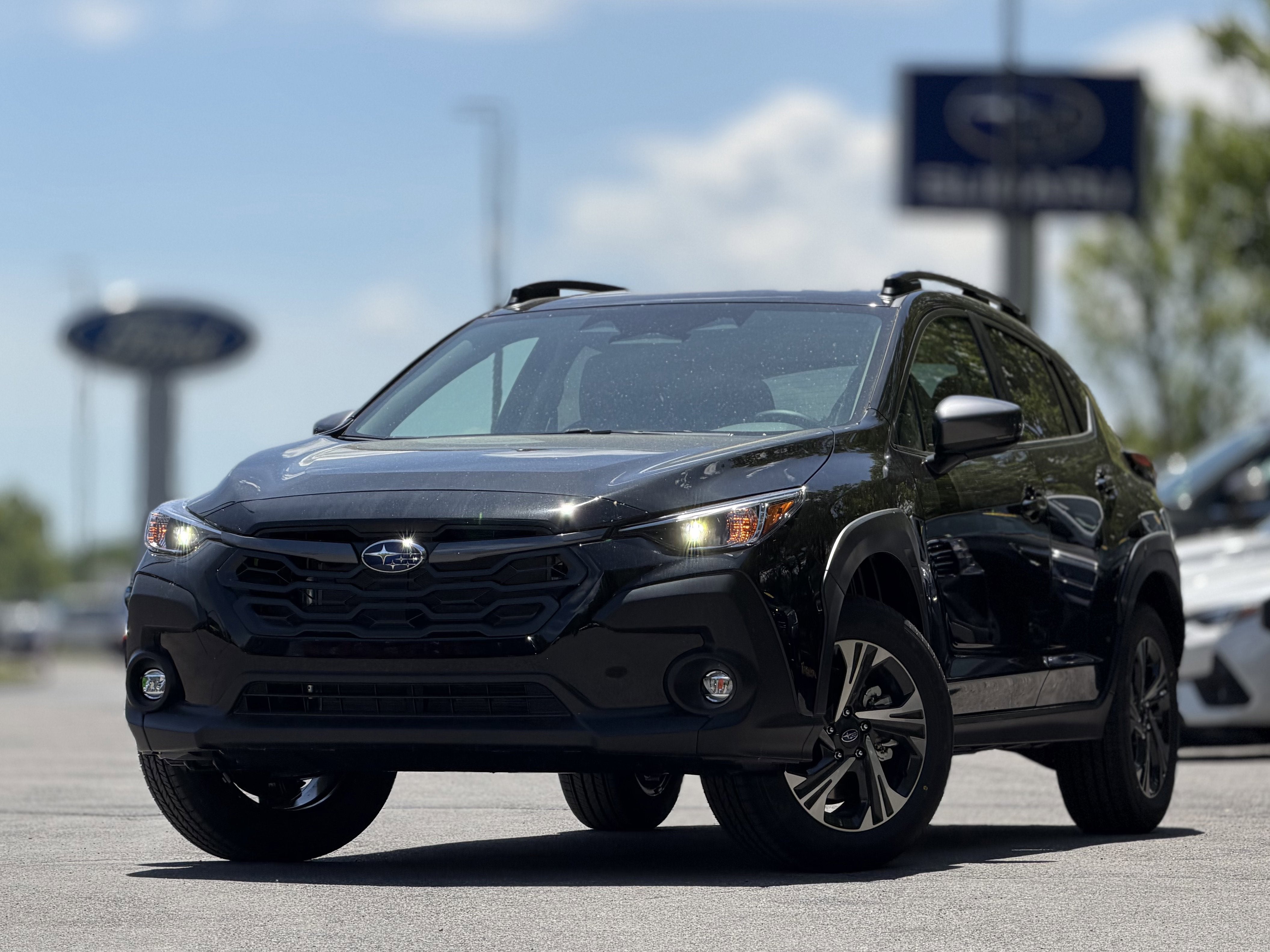 2026 Subaru CROSSTREK Premium in Crystal Black Silica — front three-quarter view