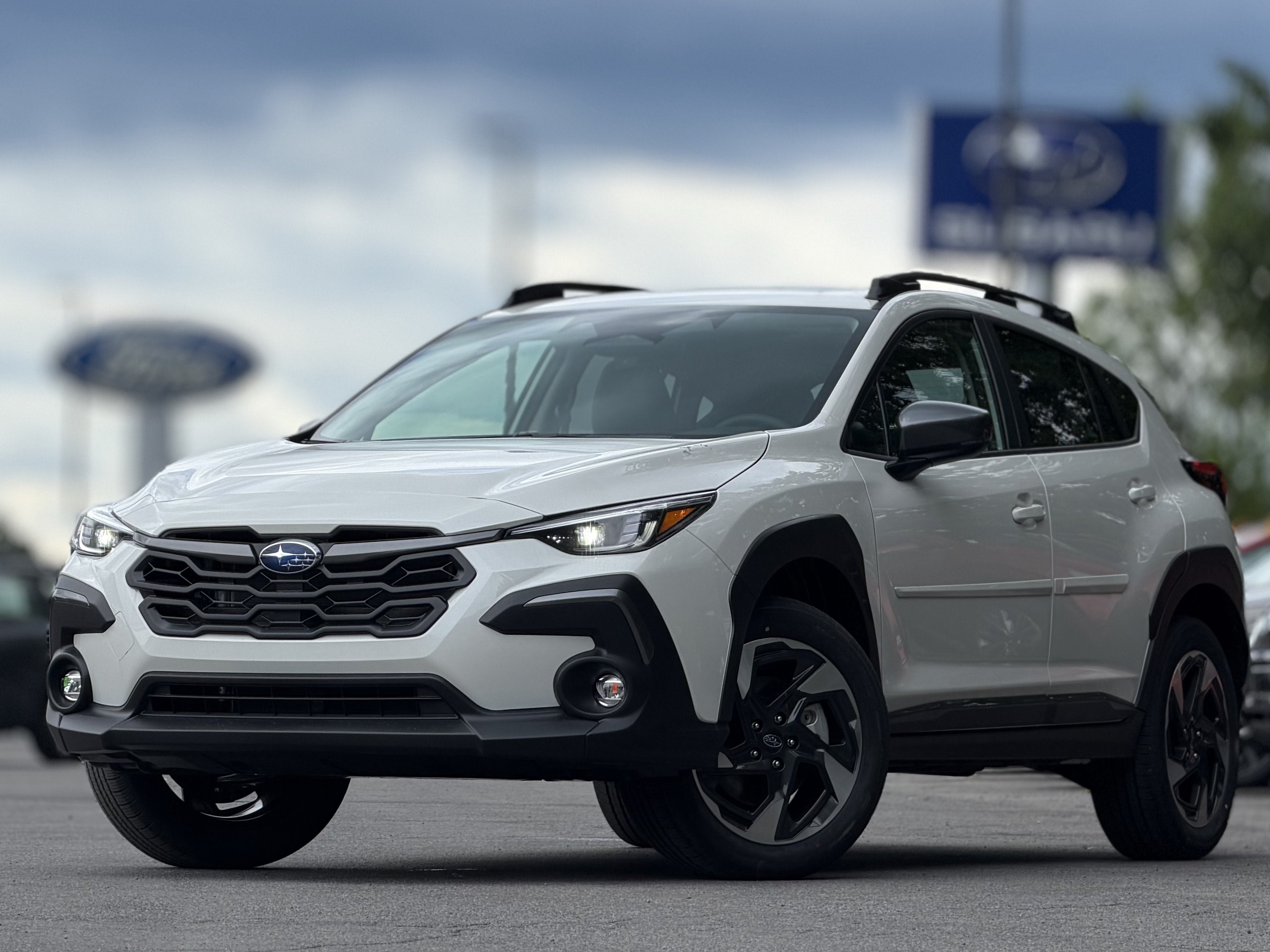 2026 Subaru CROSSTREK Limited in Crystal White Pearl — front three-quarter view