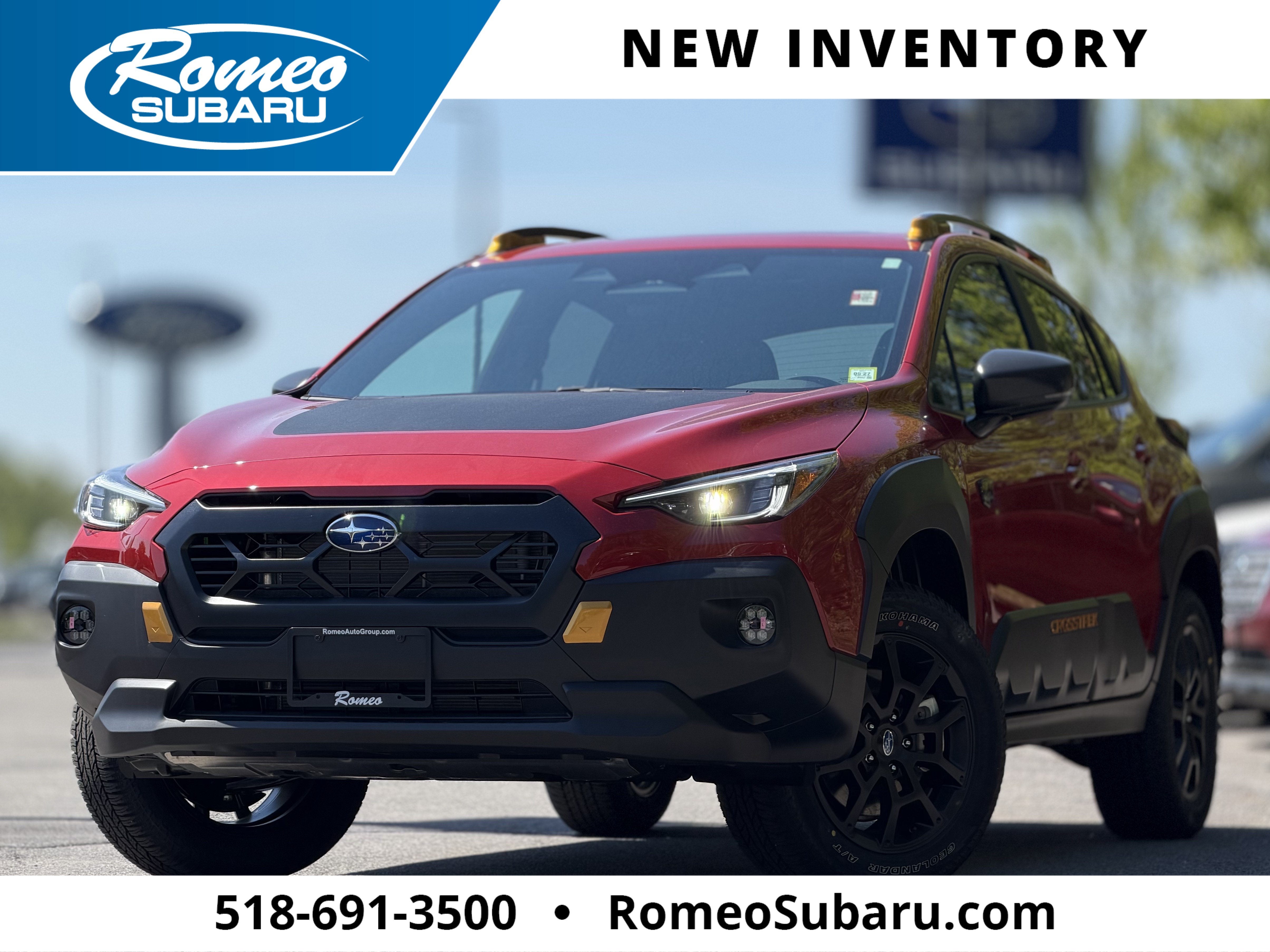 2026 Subaru CROSSTREK Wilderness in Lithium Red Pearl — front three-quarter view