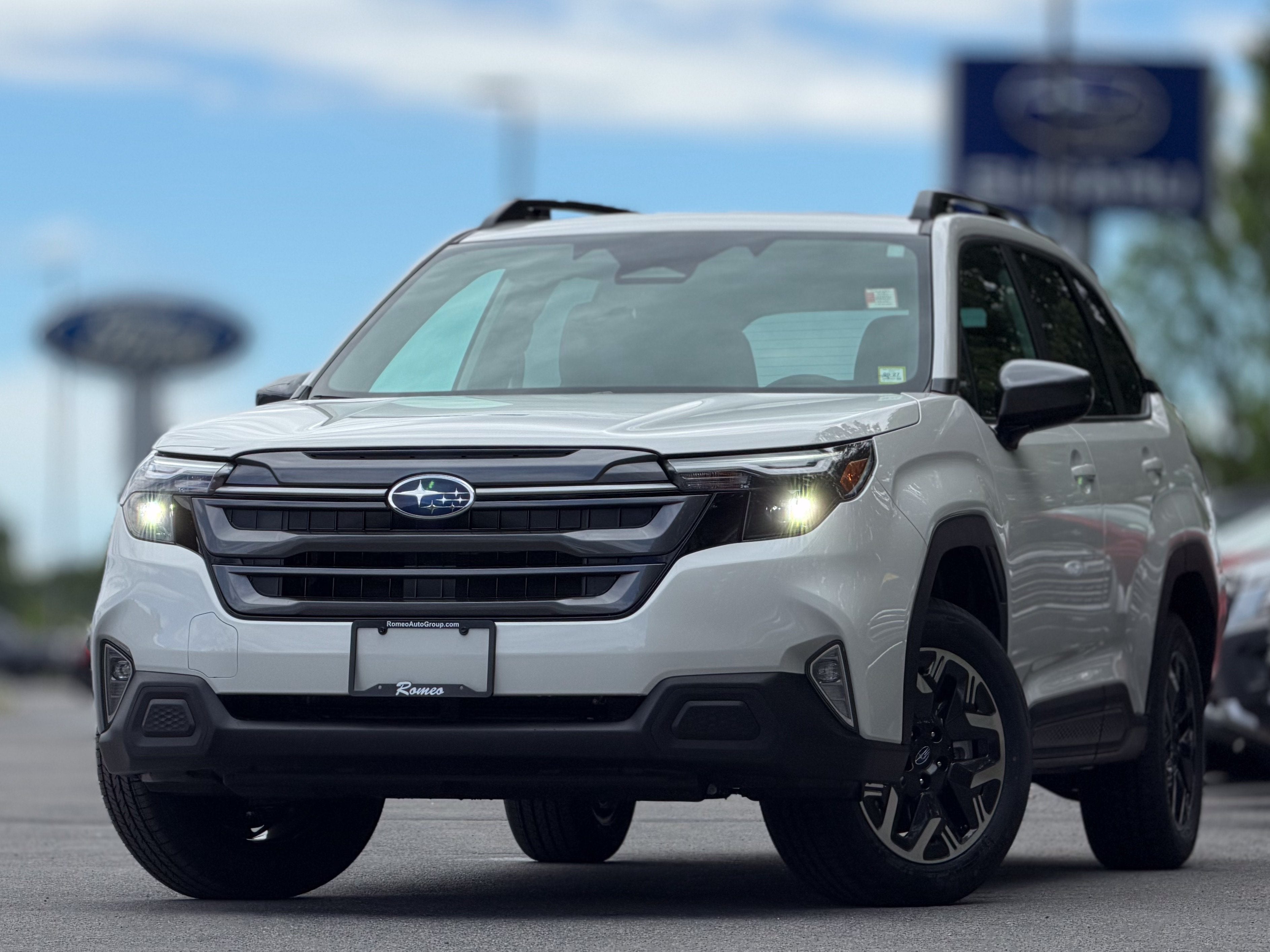 2026 Subaru FORESTER Premium in Crystal White Pearl — front three-quarter view