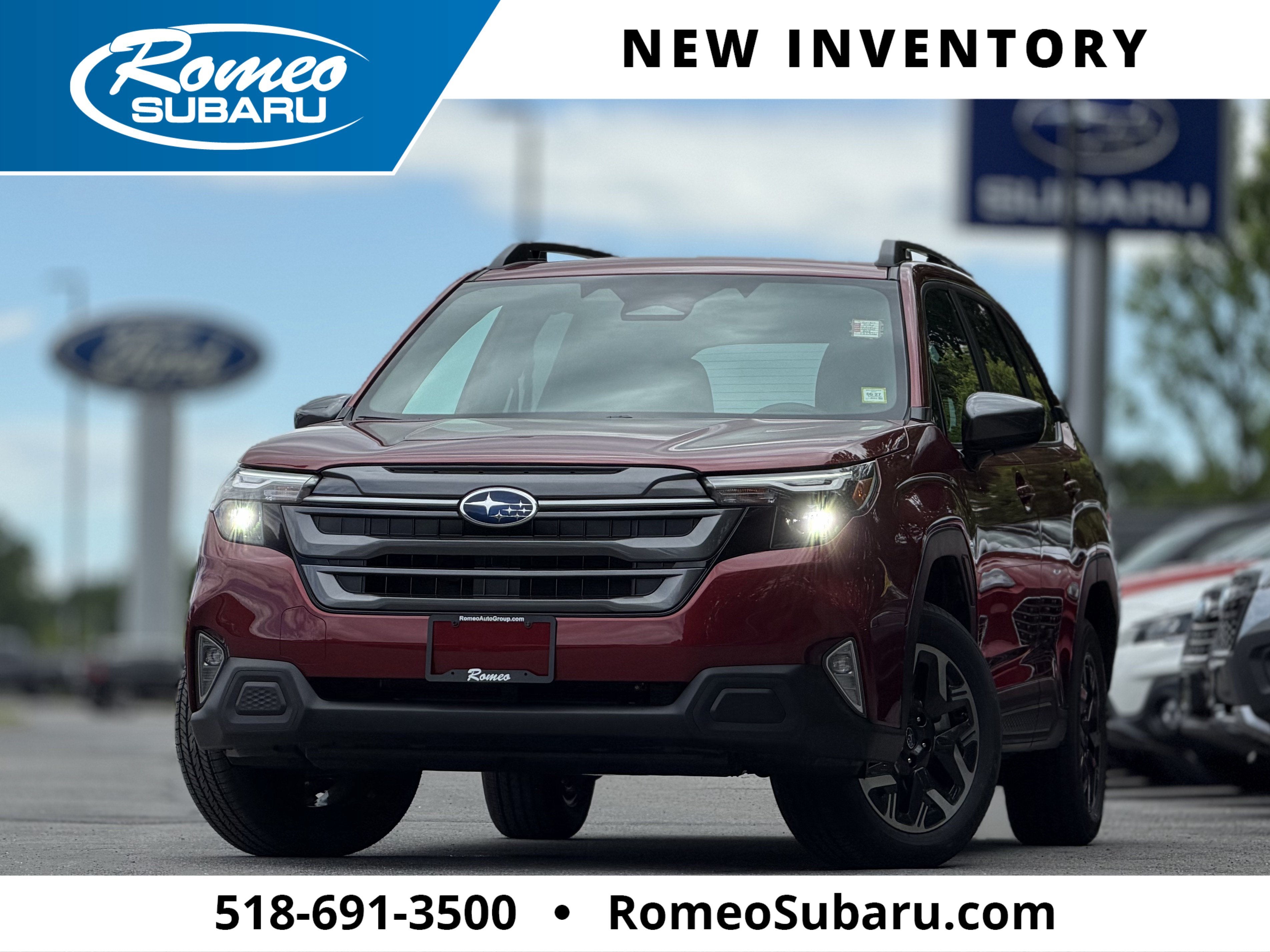 2026 Subaru FORESTER Premium in Crimson Red Pearl — front three-quarter view