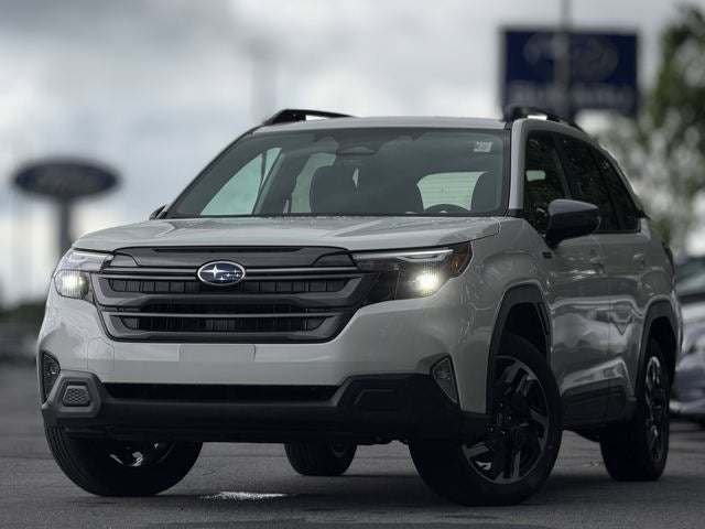 2026 Subaru FORESTER Premium Hybrid in Crystal White Pearl — front three-quarter view