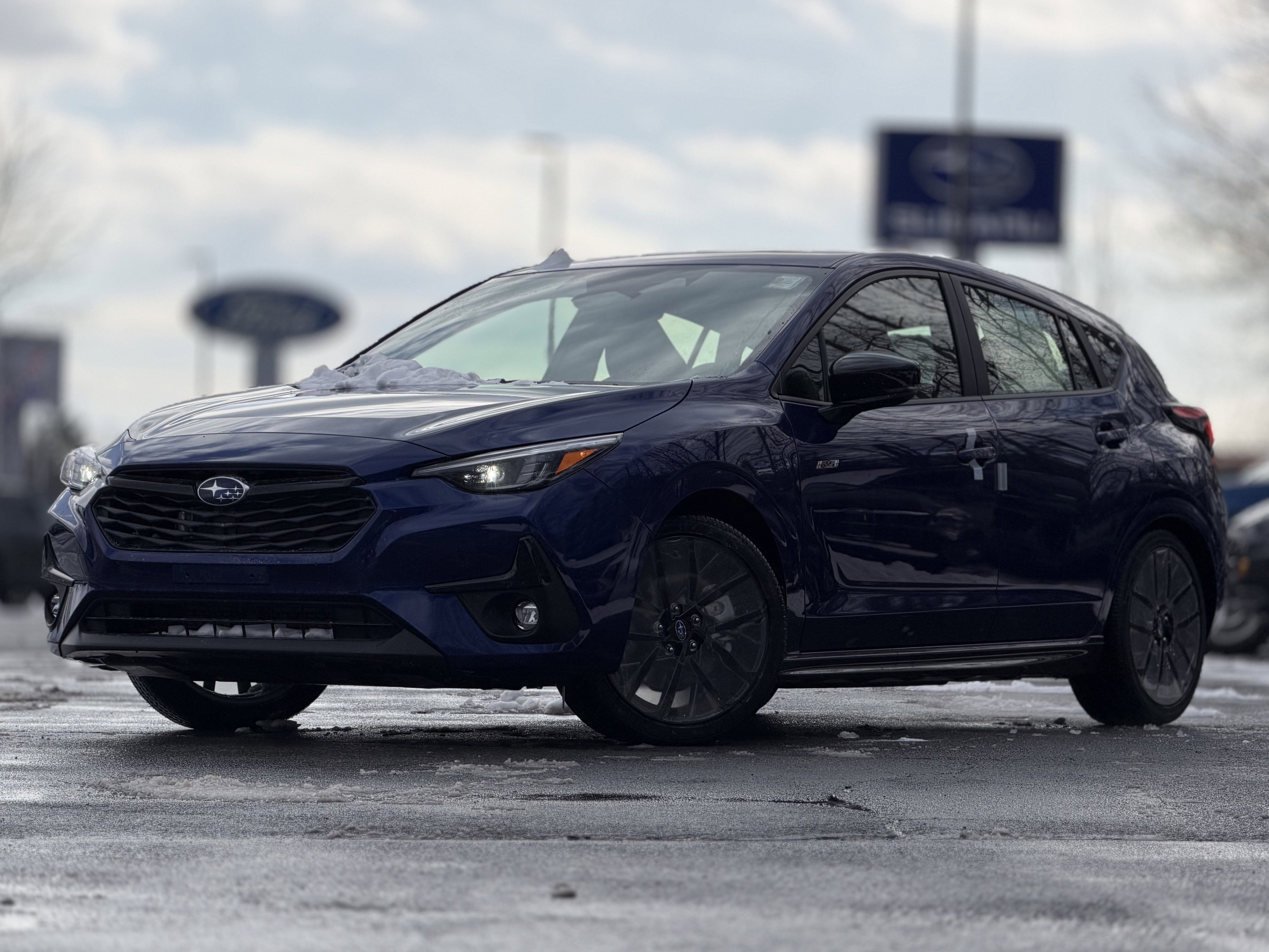 2026 Subaru IMPREZA RS in Sapphire Blue Pearl — front three-quarter view