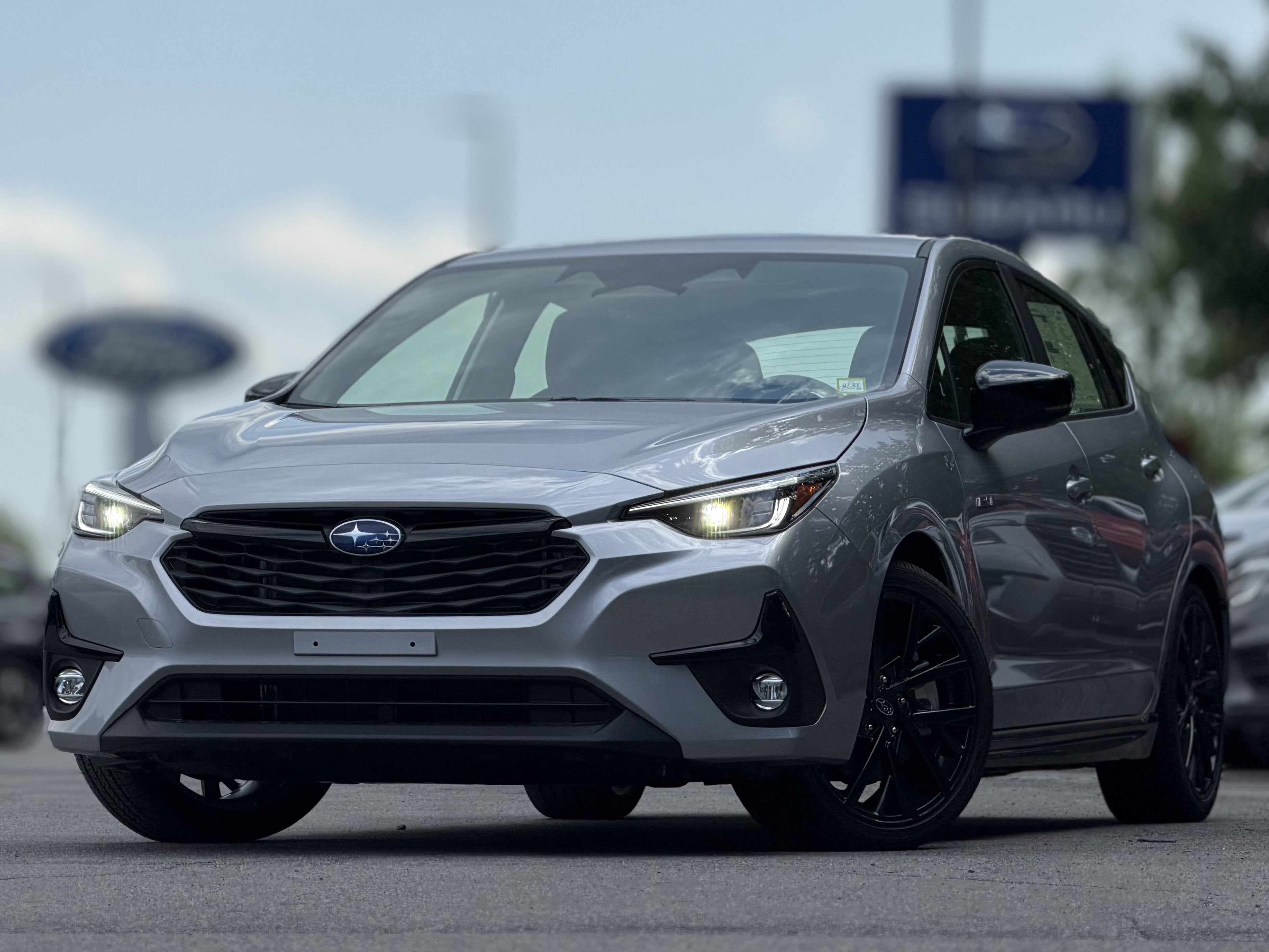 2026 Subaru IMPREZA RS in Ice Silver Metallic — front three-quarter view