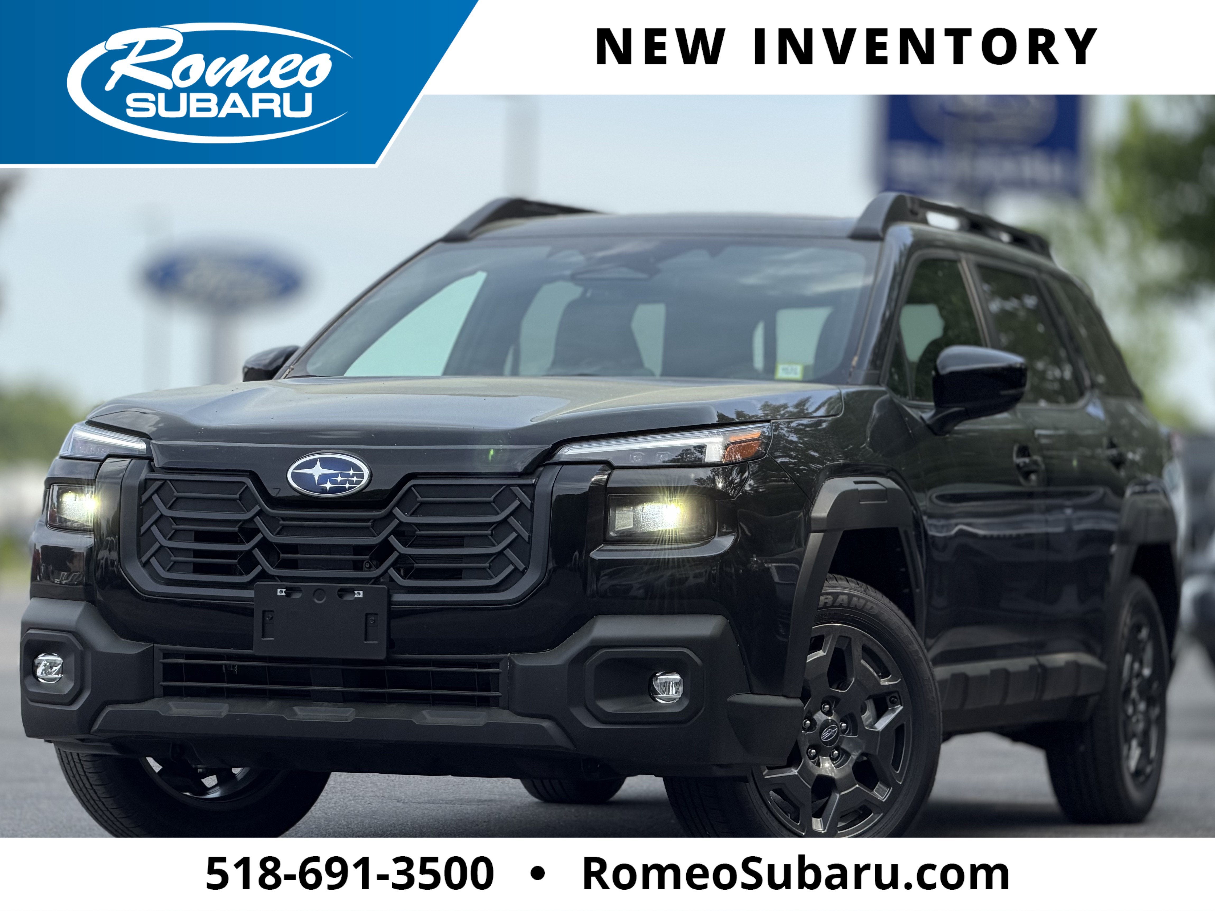 2026 Subaru OUTBACK Premium in Crystal Black Silica — front three-quarter view