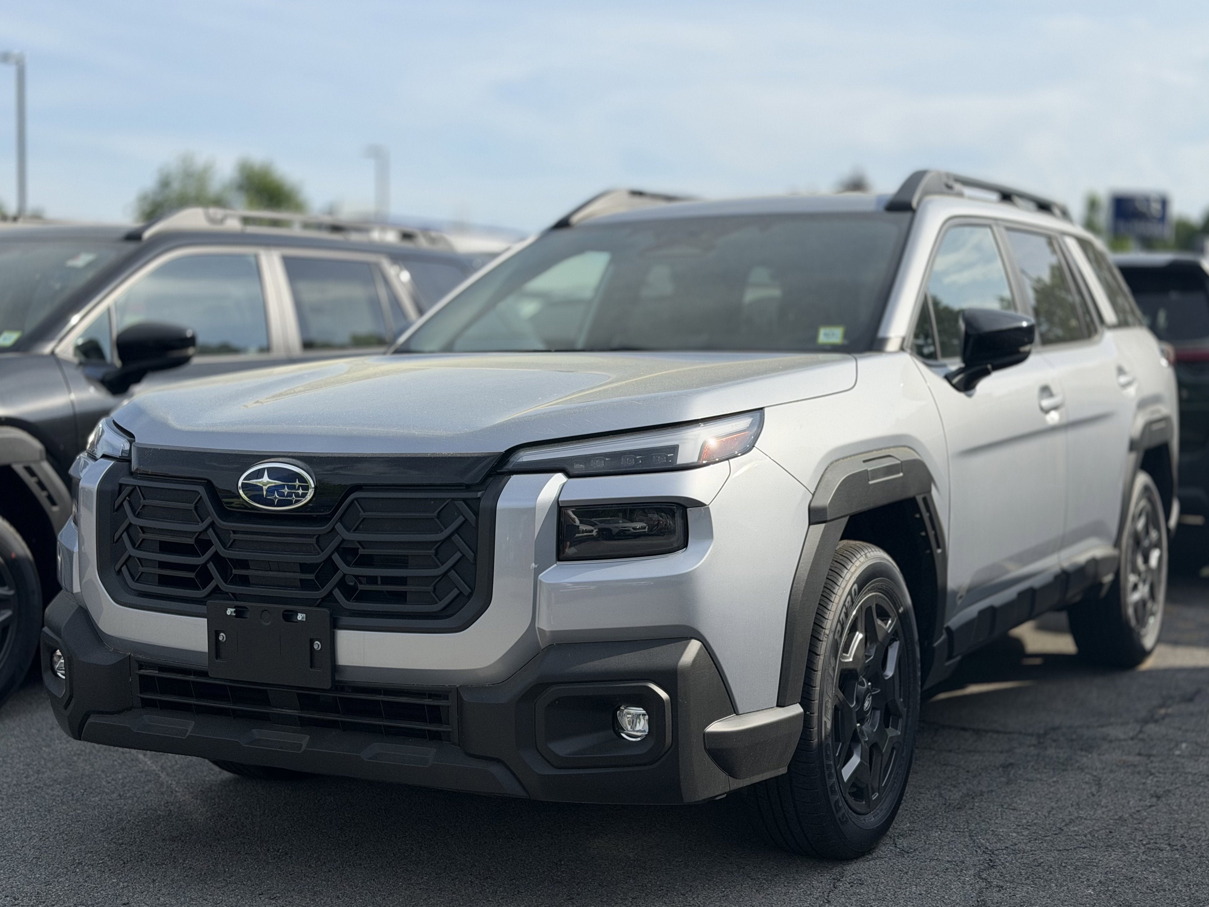 2026 Subaru OUTBACK Premium in Ice Silver Metallic — front three-quarter view