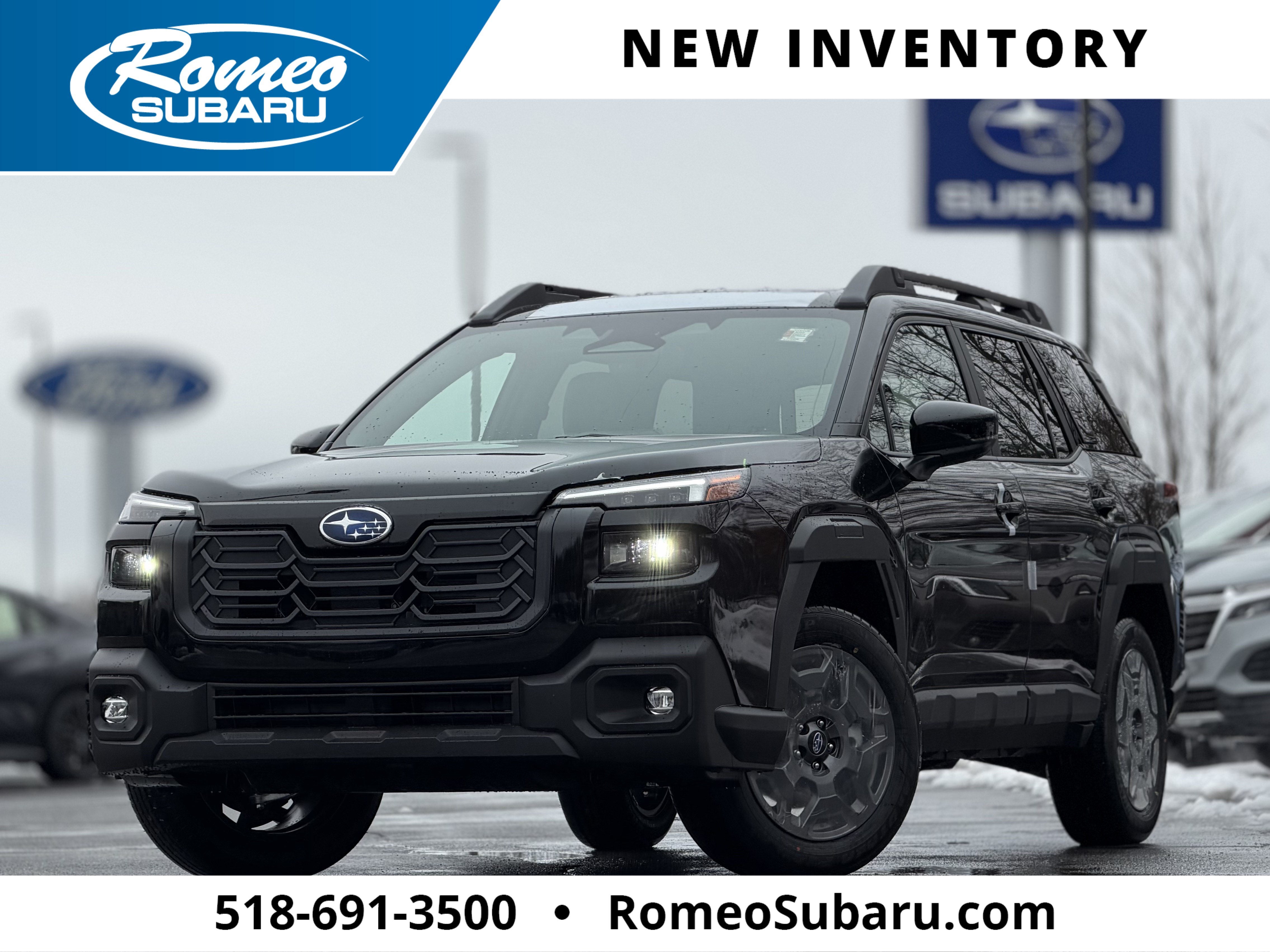 2026 Subaru OUTBACK Premium in Crystal Black Silica — front three-quarter view