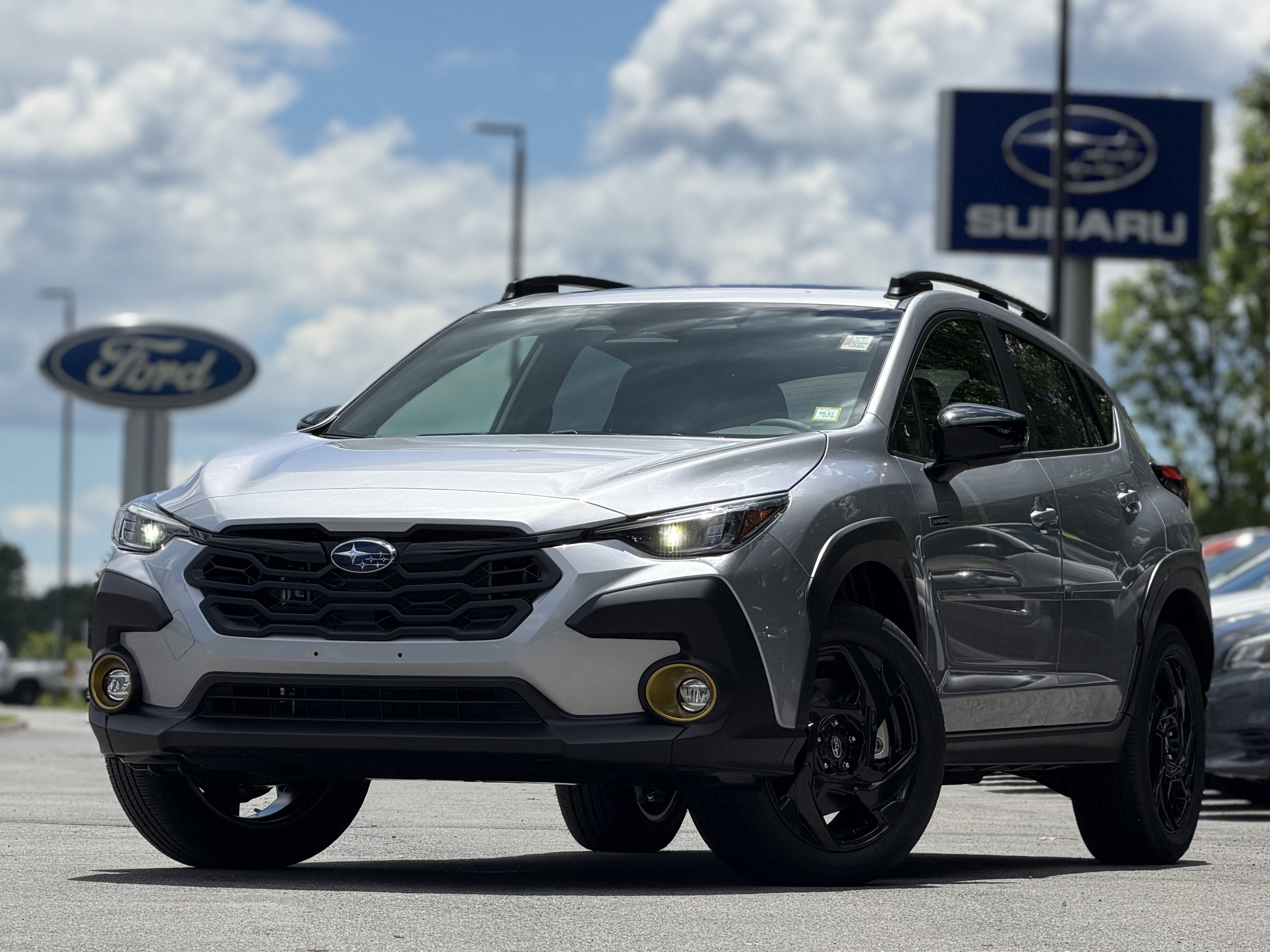 2026 Subaru CROSSTREK Sport Hybrid in Ice Silver Metallic — front three-quarter view