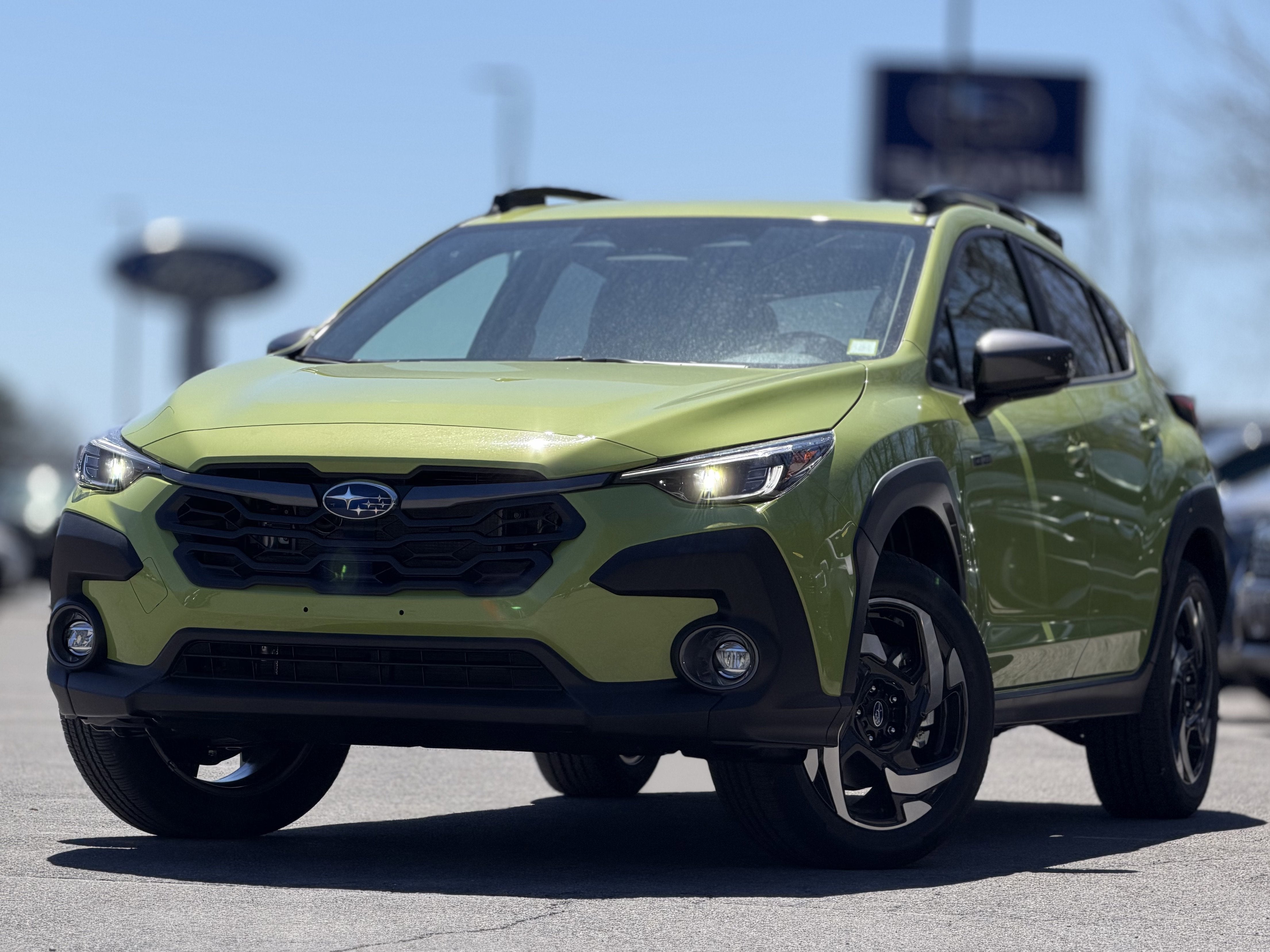 2026 Subaru CROSSTREK Limited Hybrid in Citron Yellow Pearl — front three-quarter view