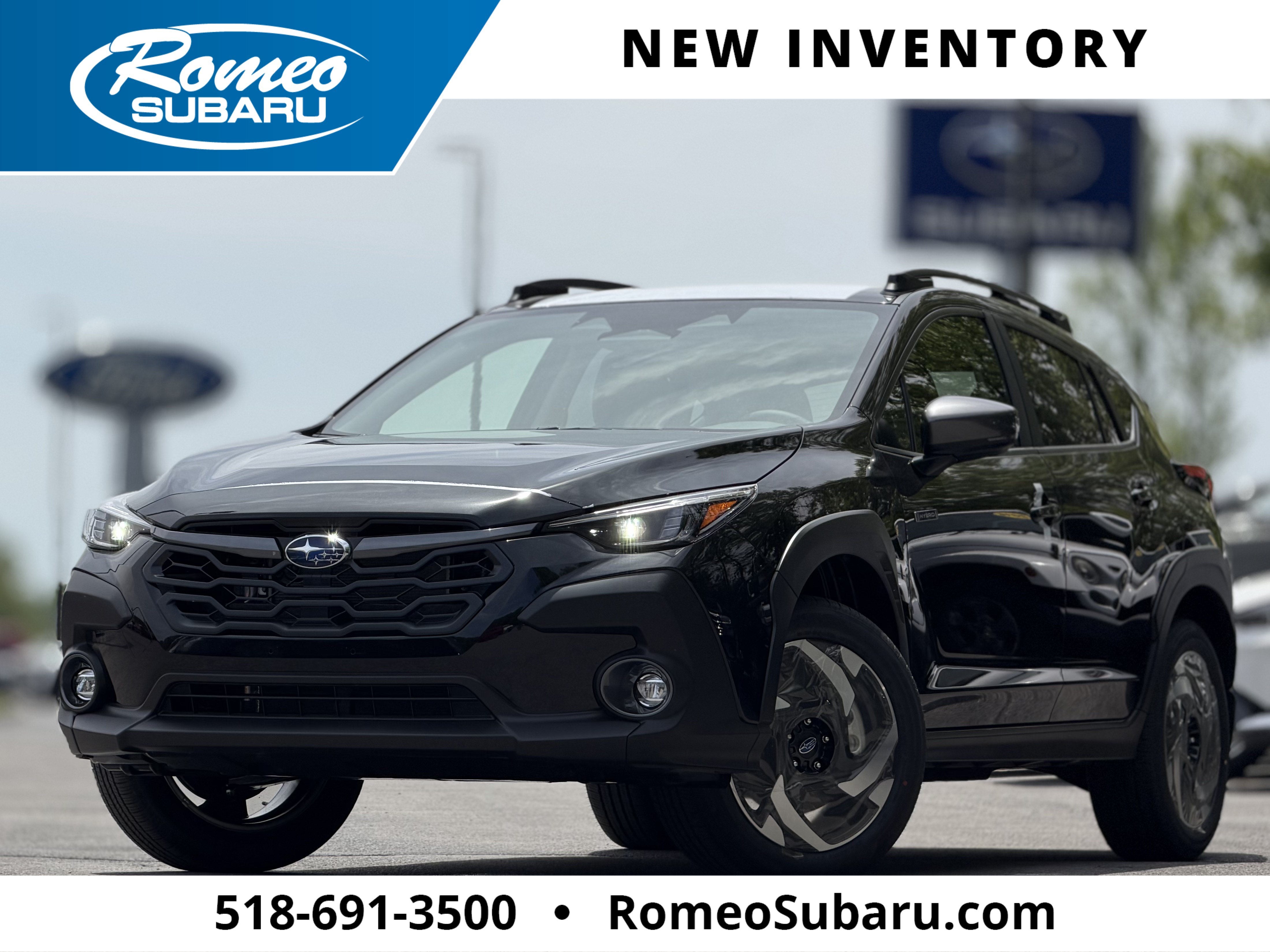 2026 Subaru CROSSTREK Limited Hybrid in Crystal Black Silica — front three-quarter view