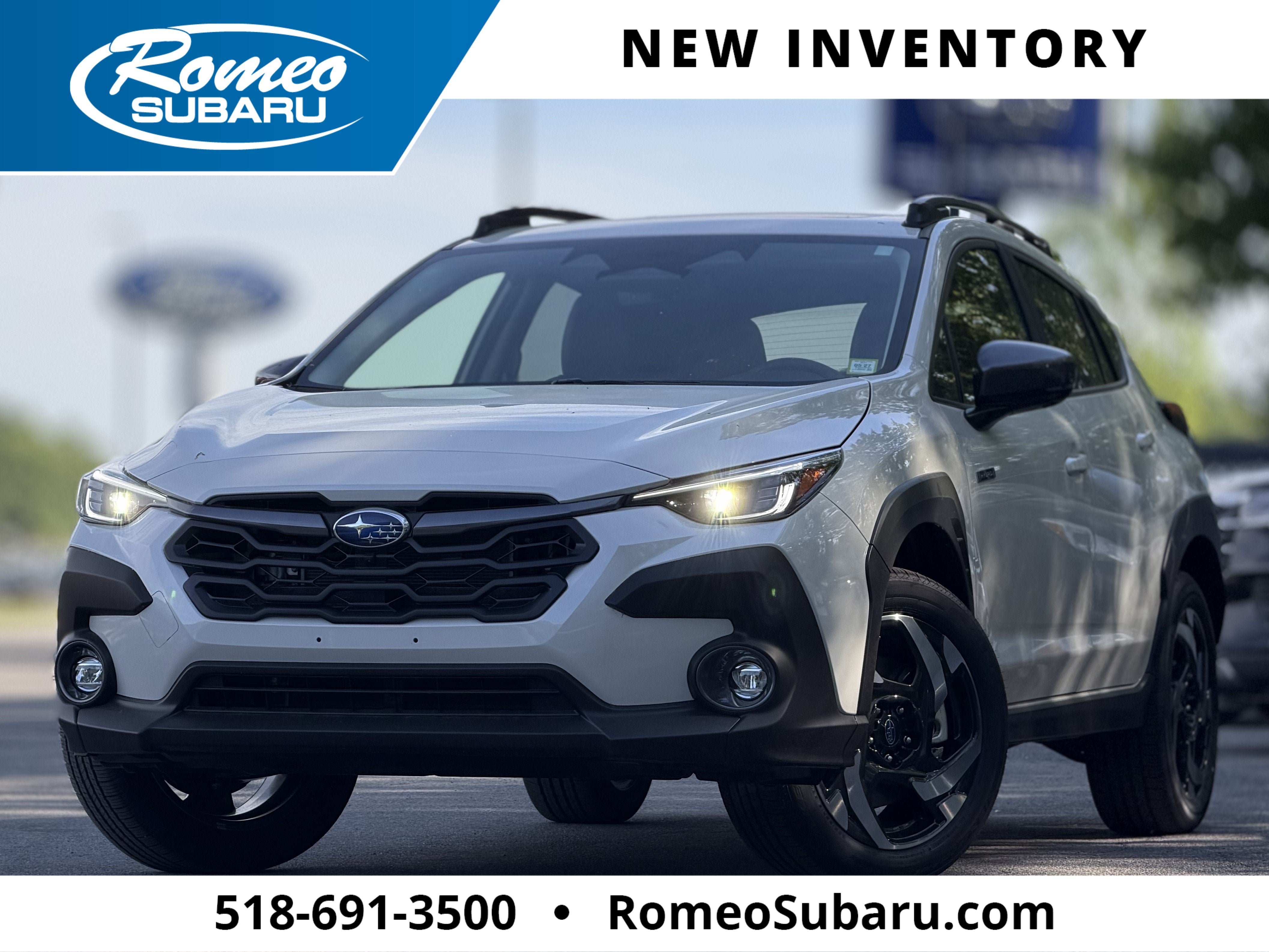 2026 Subaru CROSSTREK Limited Hybrid in Crystal White Pearl — front three-quarter view