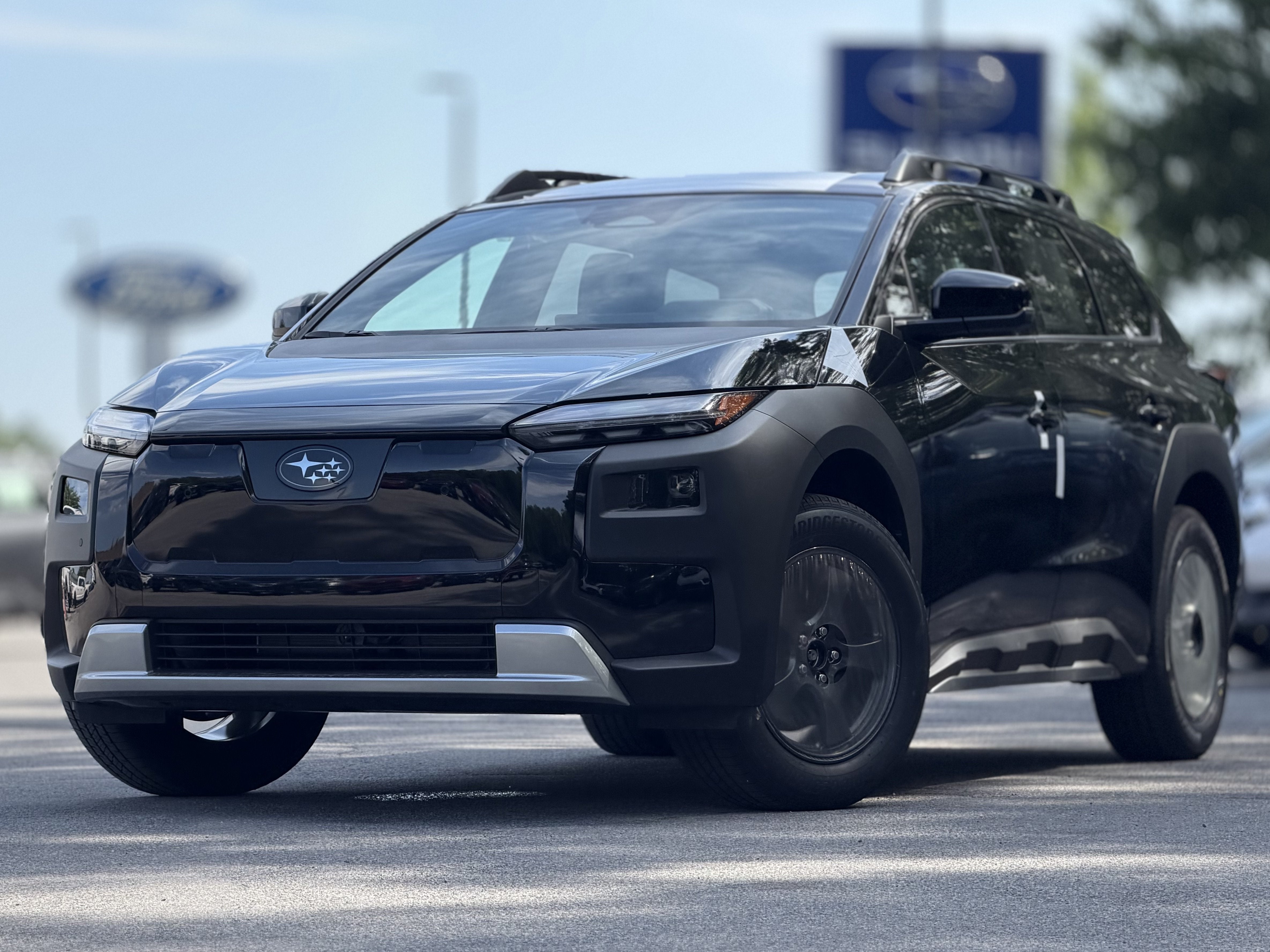 2026 Subaru TRAILSEEKER Premium in Crystal Black Silica — front three-quarter view