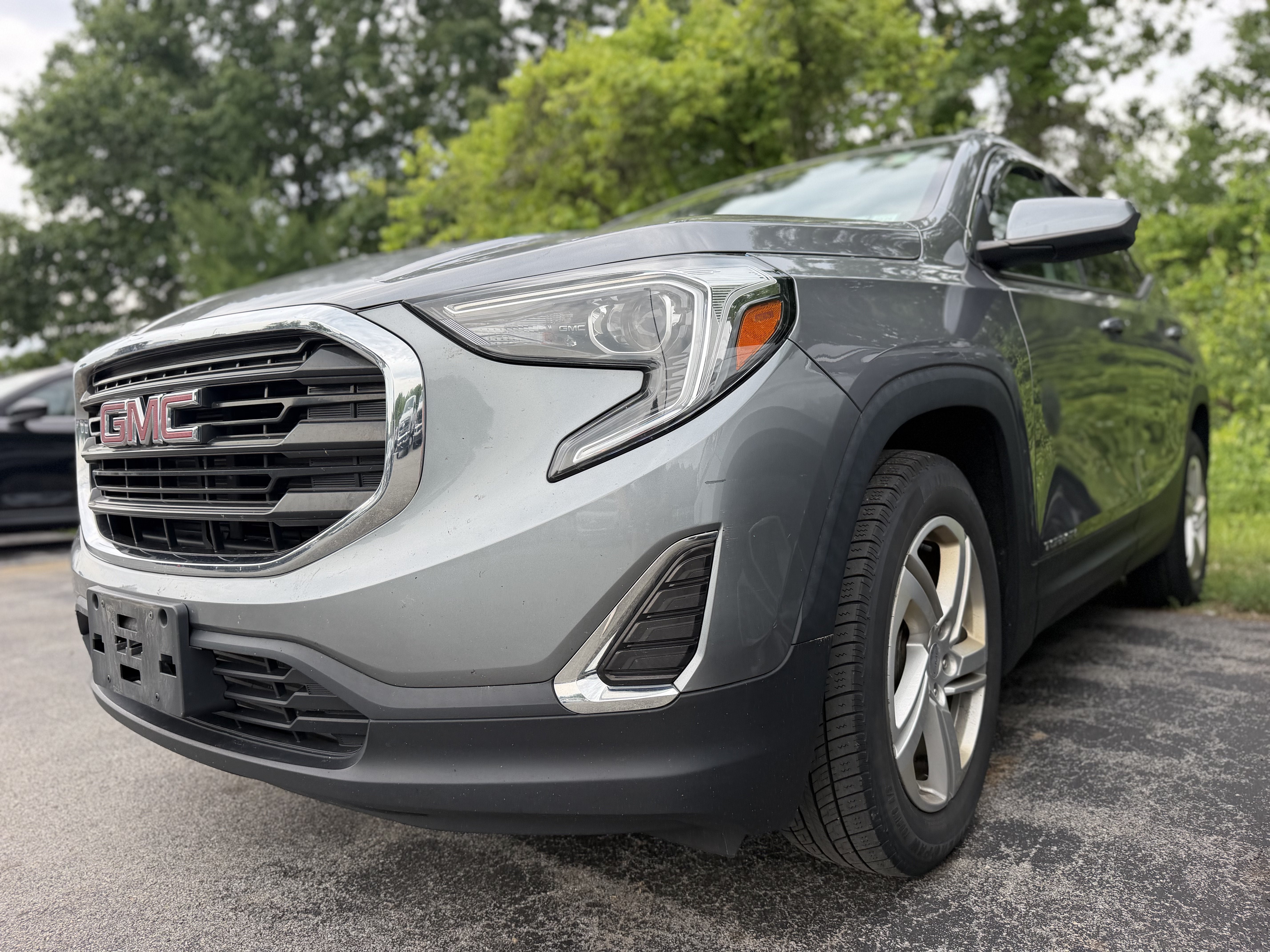 2019 GMC Terrain SLE in Satin Steel Metallic — front three-quarter view