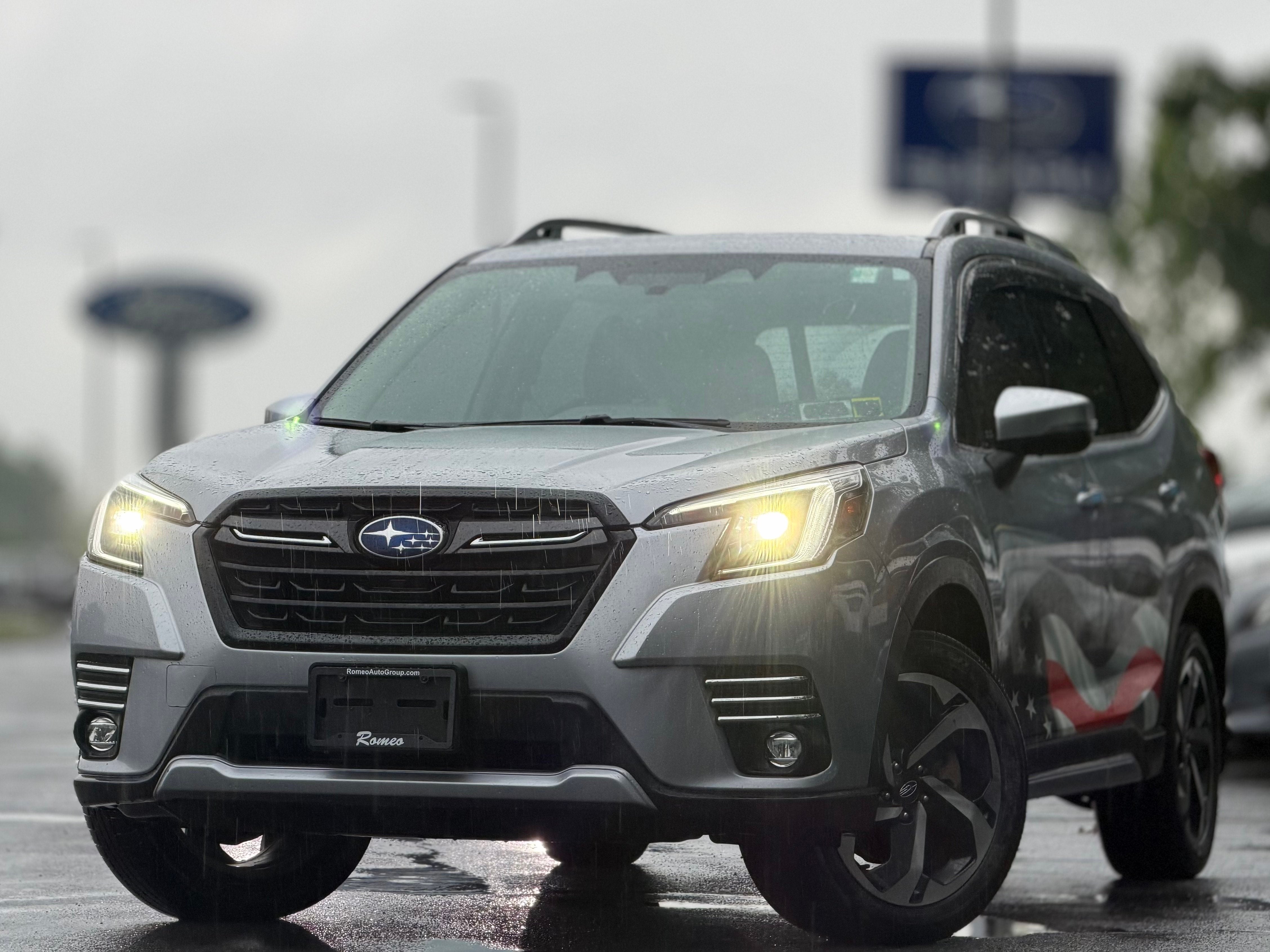 2023 Subaru Forester Touring in Ice Silver Metallic — front three-quarter view