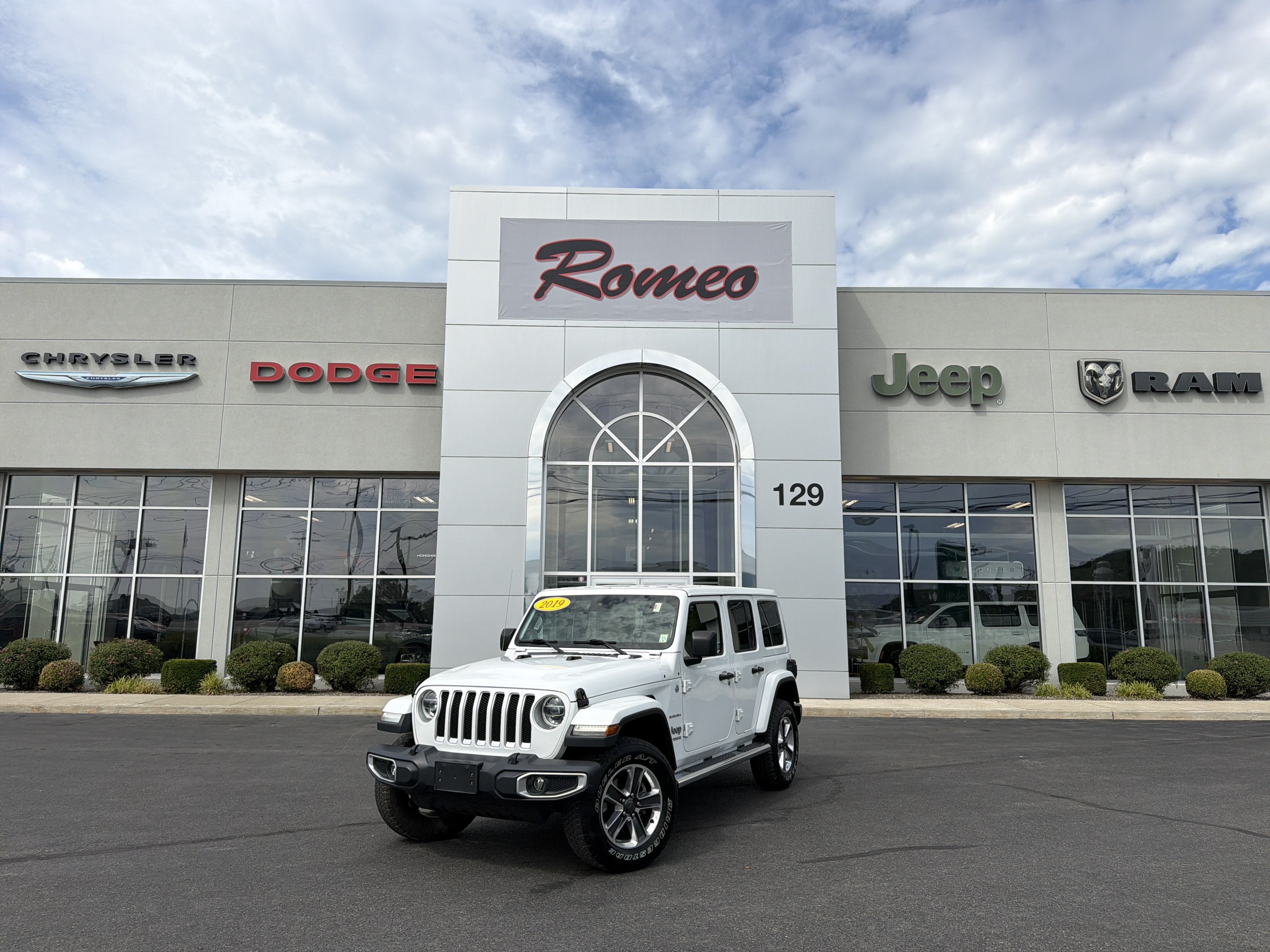 2019 Jeep Wrangler Unlimited Sahara in Other — front three-quarter view