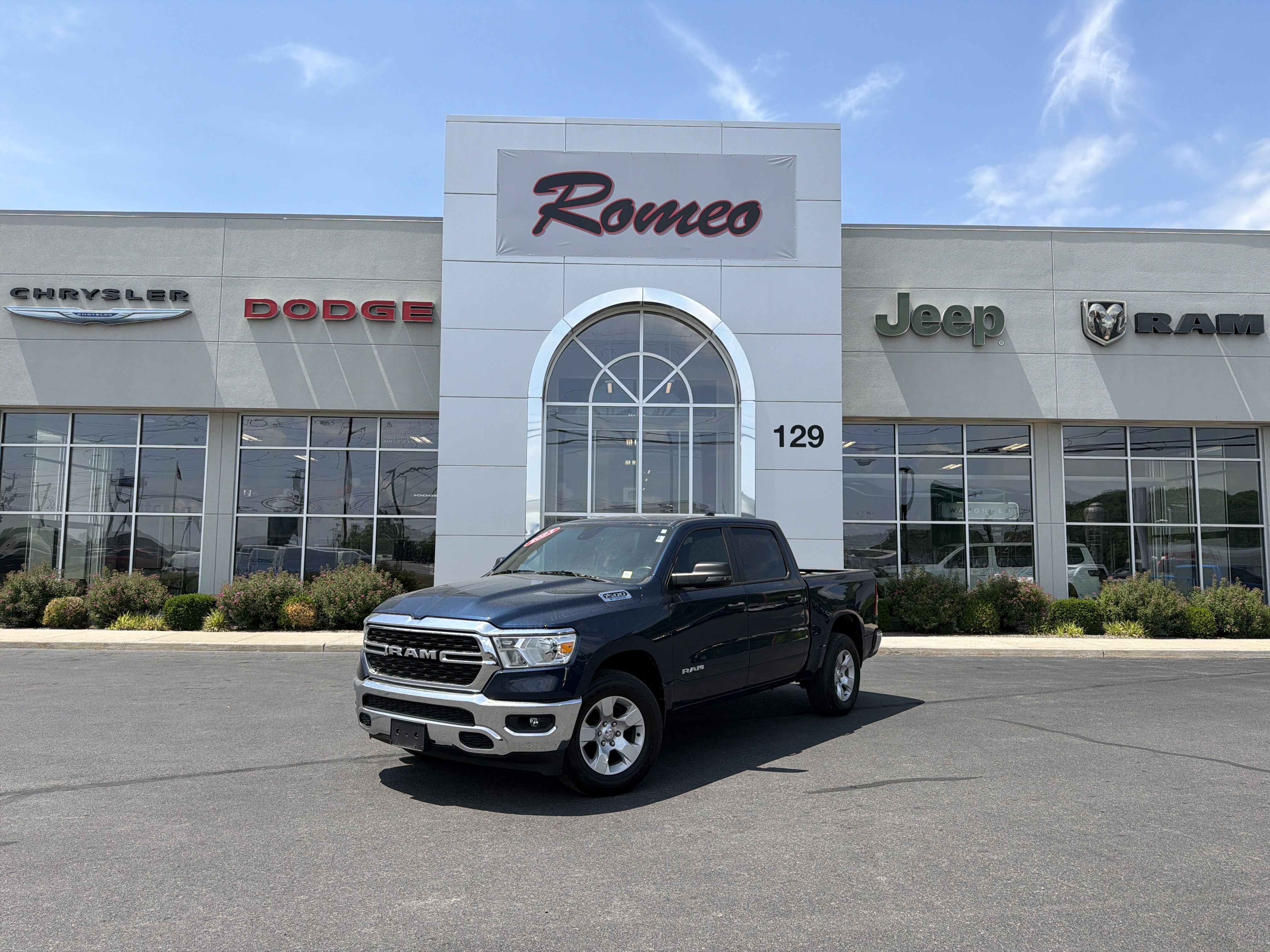 2023 RAM 1500 Big Horn/Lone Star in Other — front three-quarter view